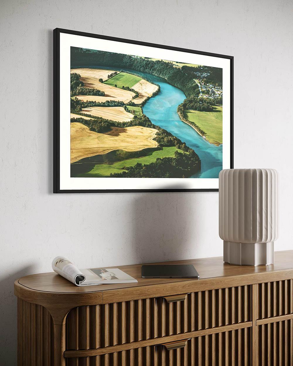 landscape art print framed in a black frame