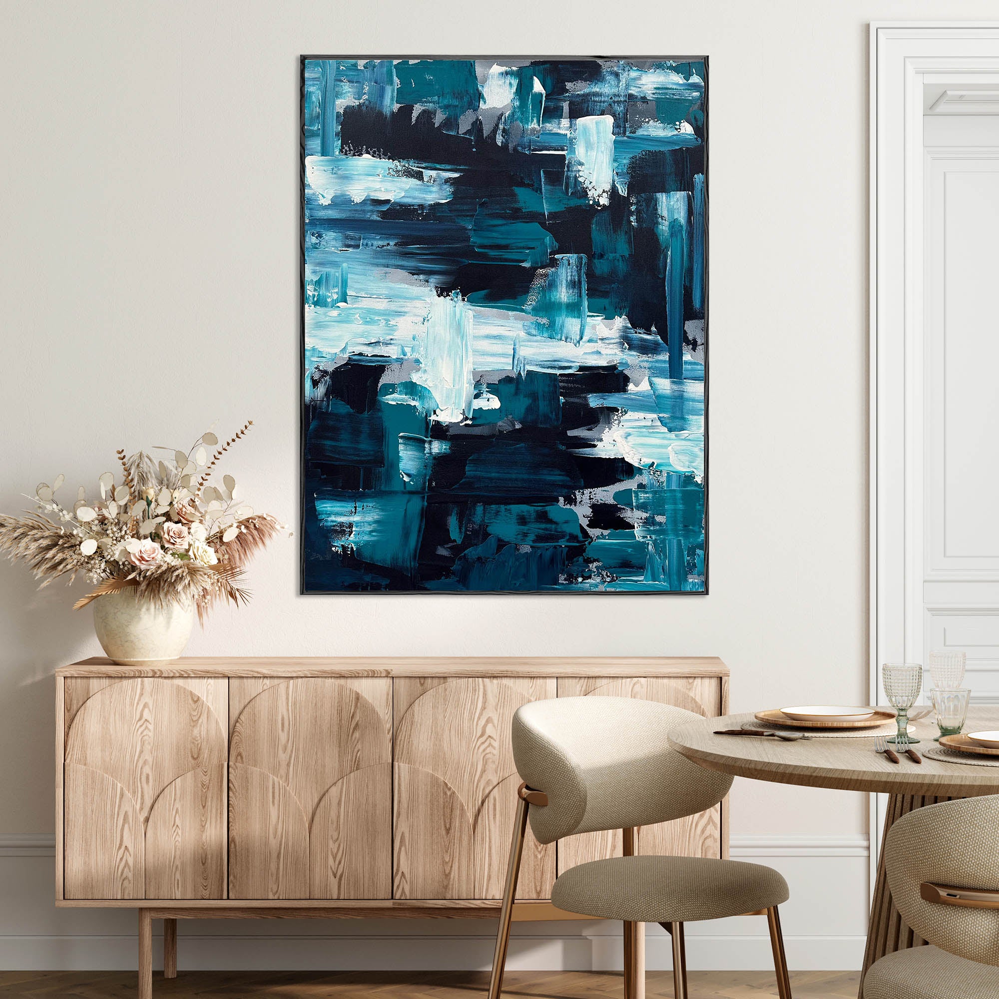 original abstract painting above a side table in living room