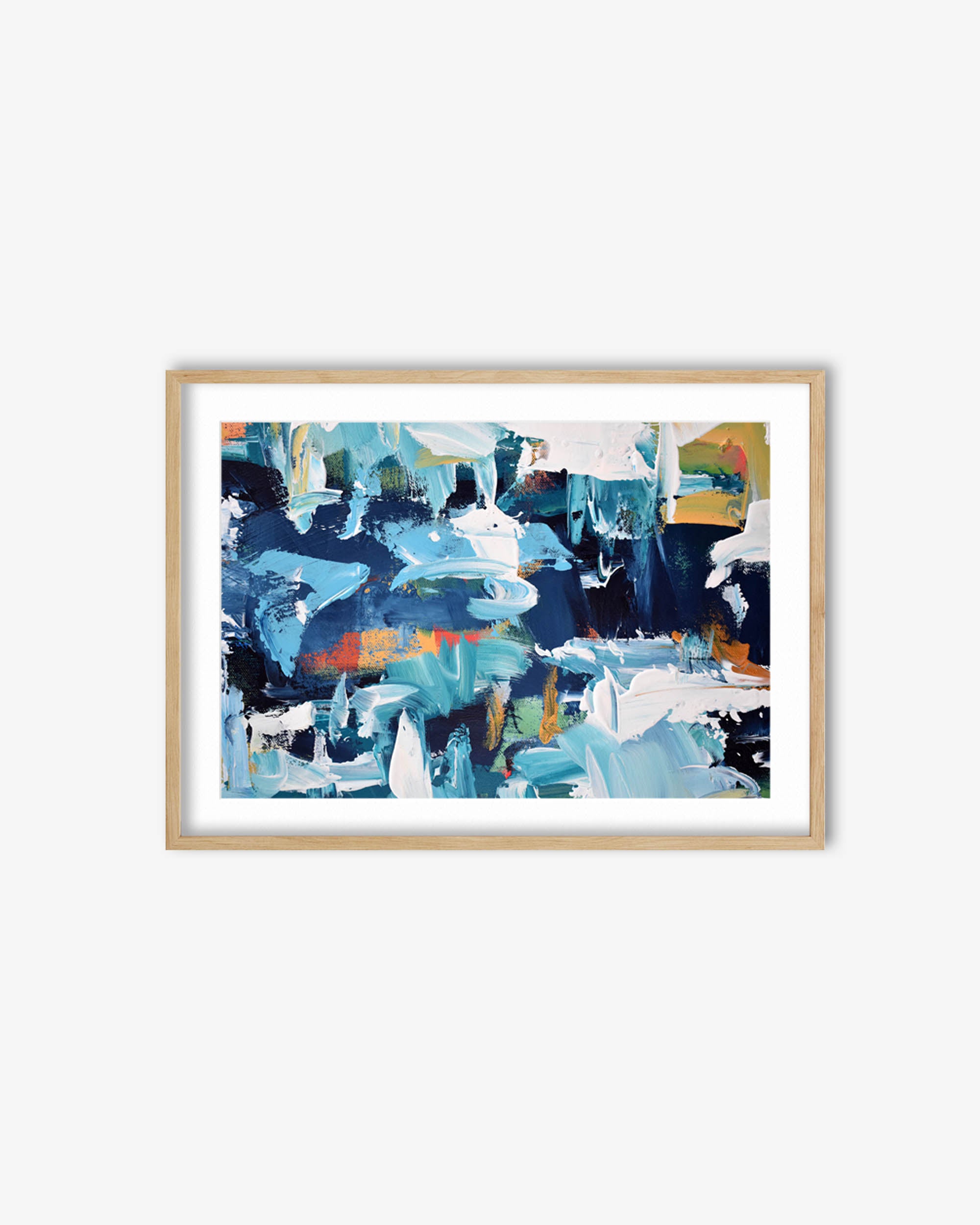 Framed abstract artwork with blue and multicolor design on a white wall
