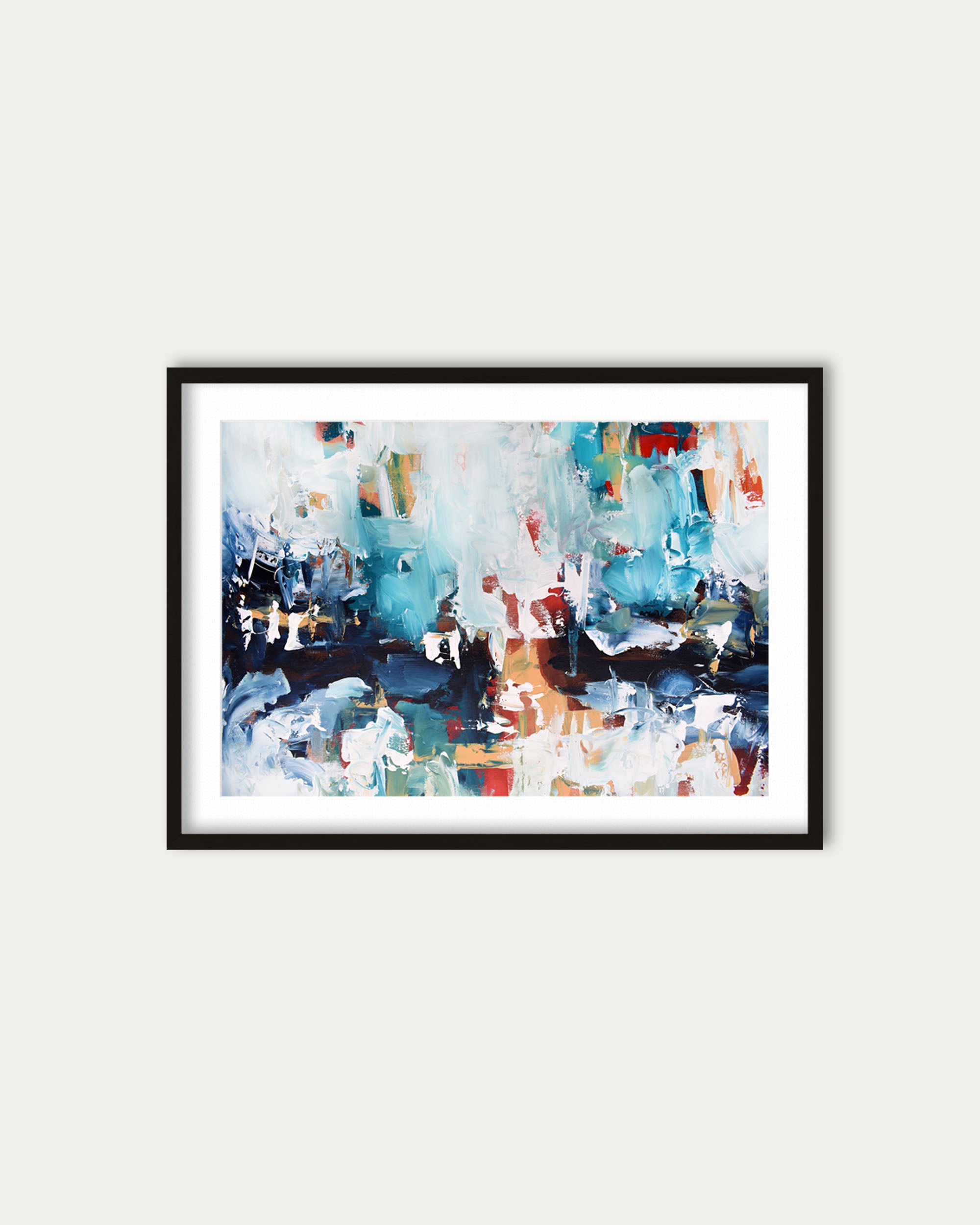 Framed abstract art print with colorful brush strokes on a white wall