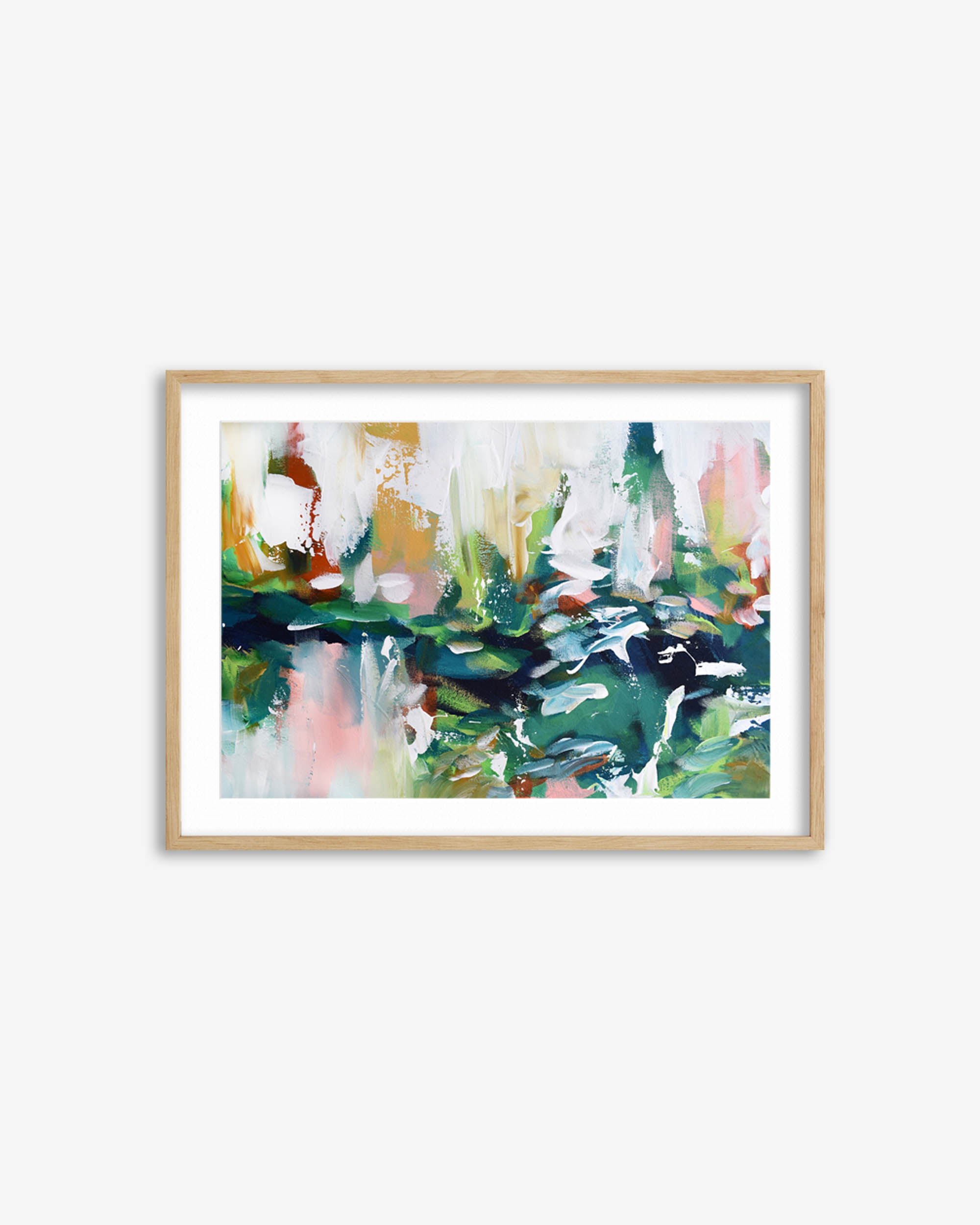 Framed abstract painting with colorful brush strokes on a white wall