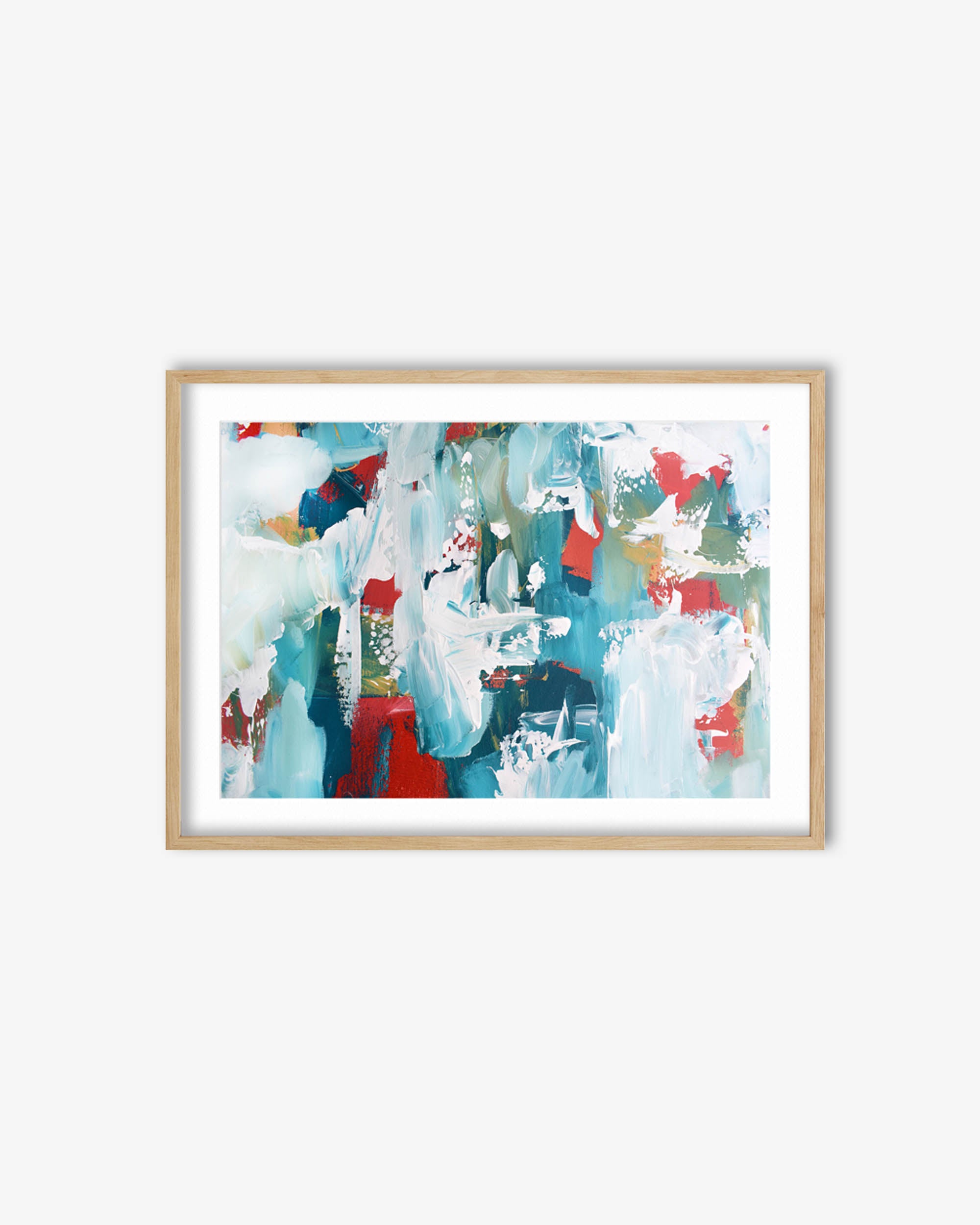 Framed abstract art print with colorful abstract design on a white wall