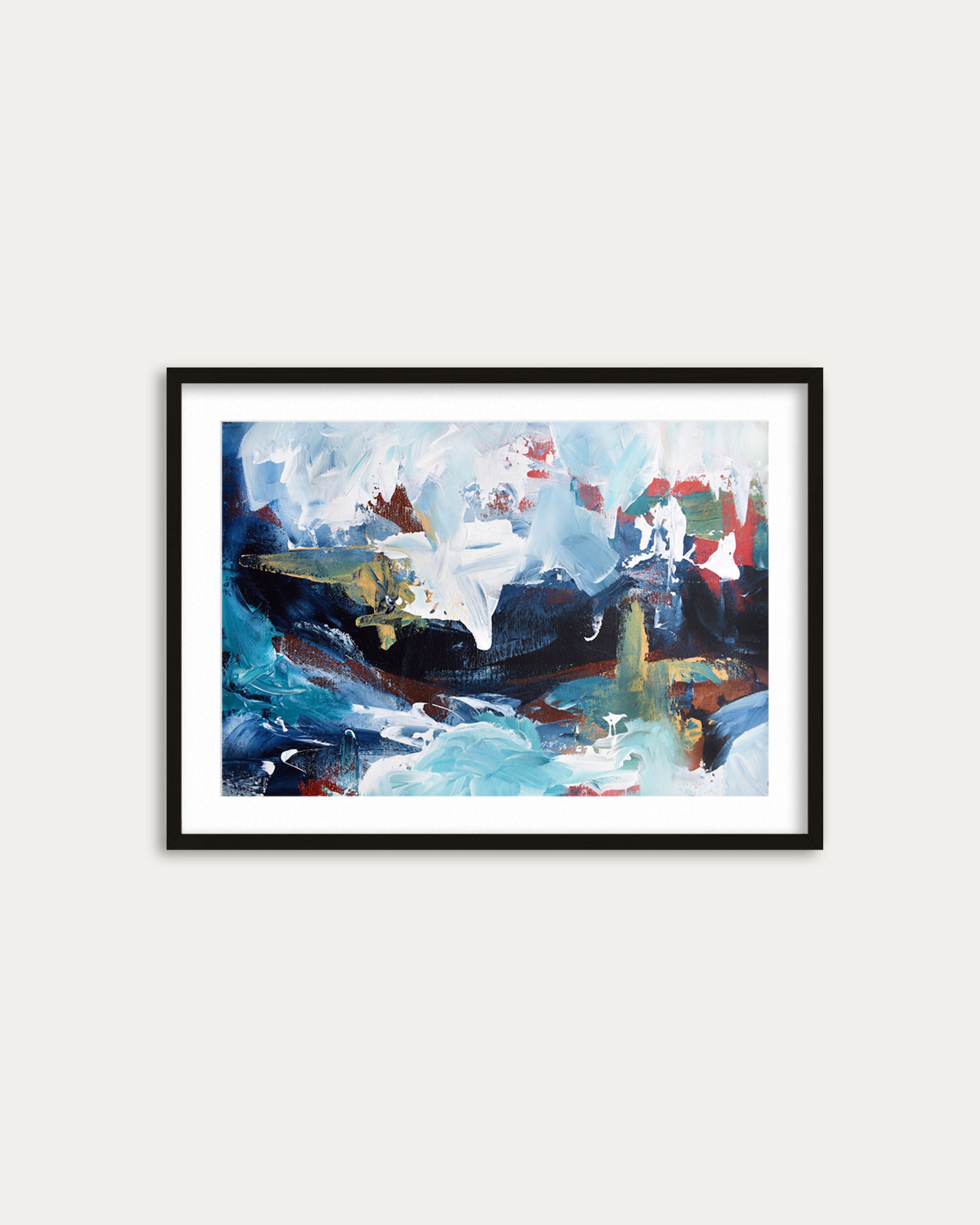 Framed abstract painting with colorful abstract design on a white wall