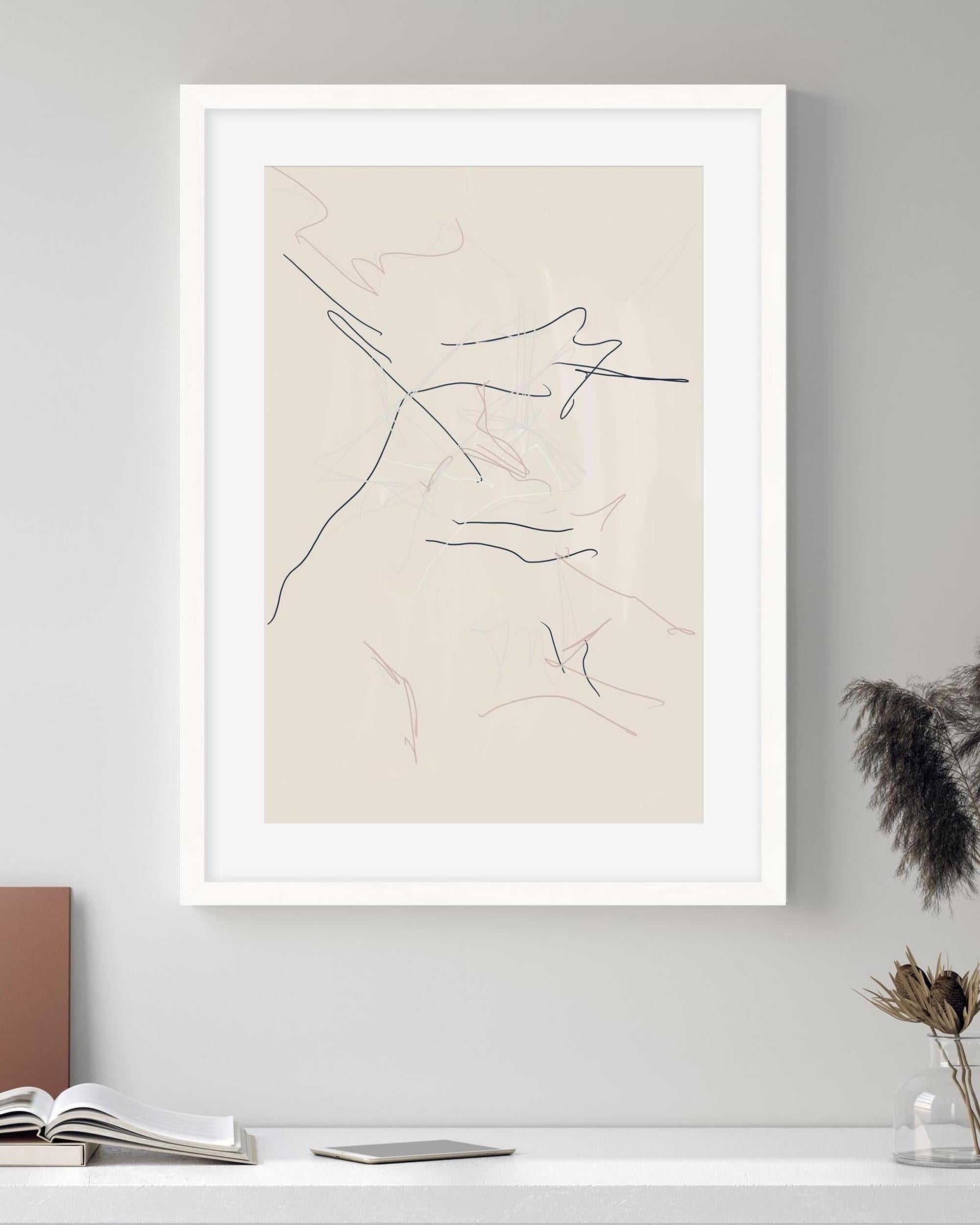 Framed abstract art print on a wall with minimal decor