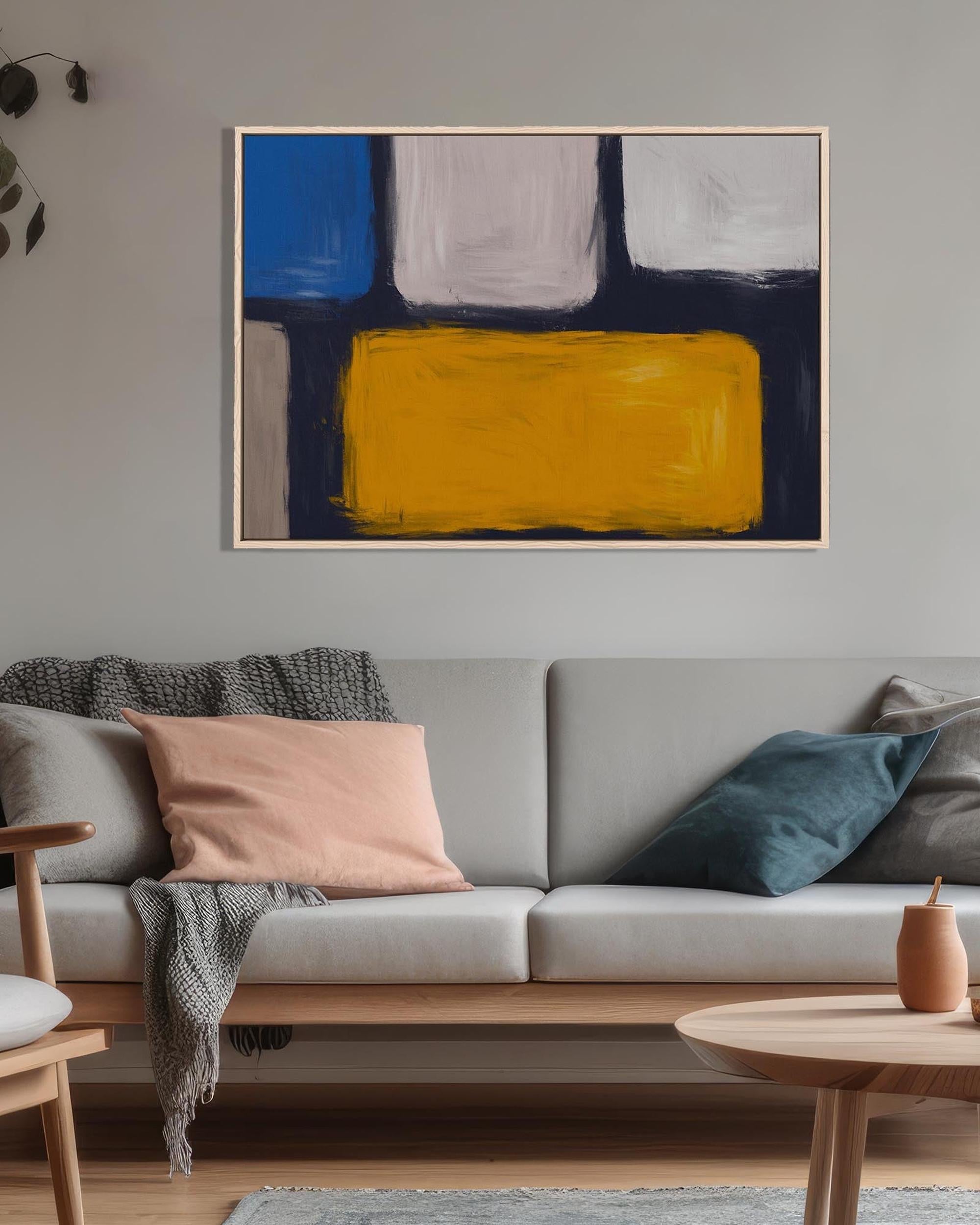 Abstract art piece on a gray wall above a sofa with colorful cushions.
