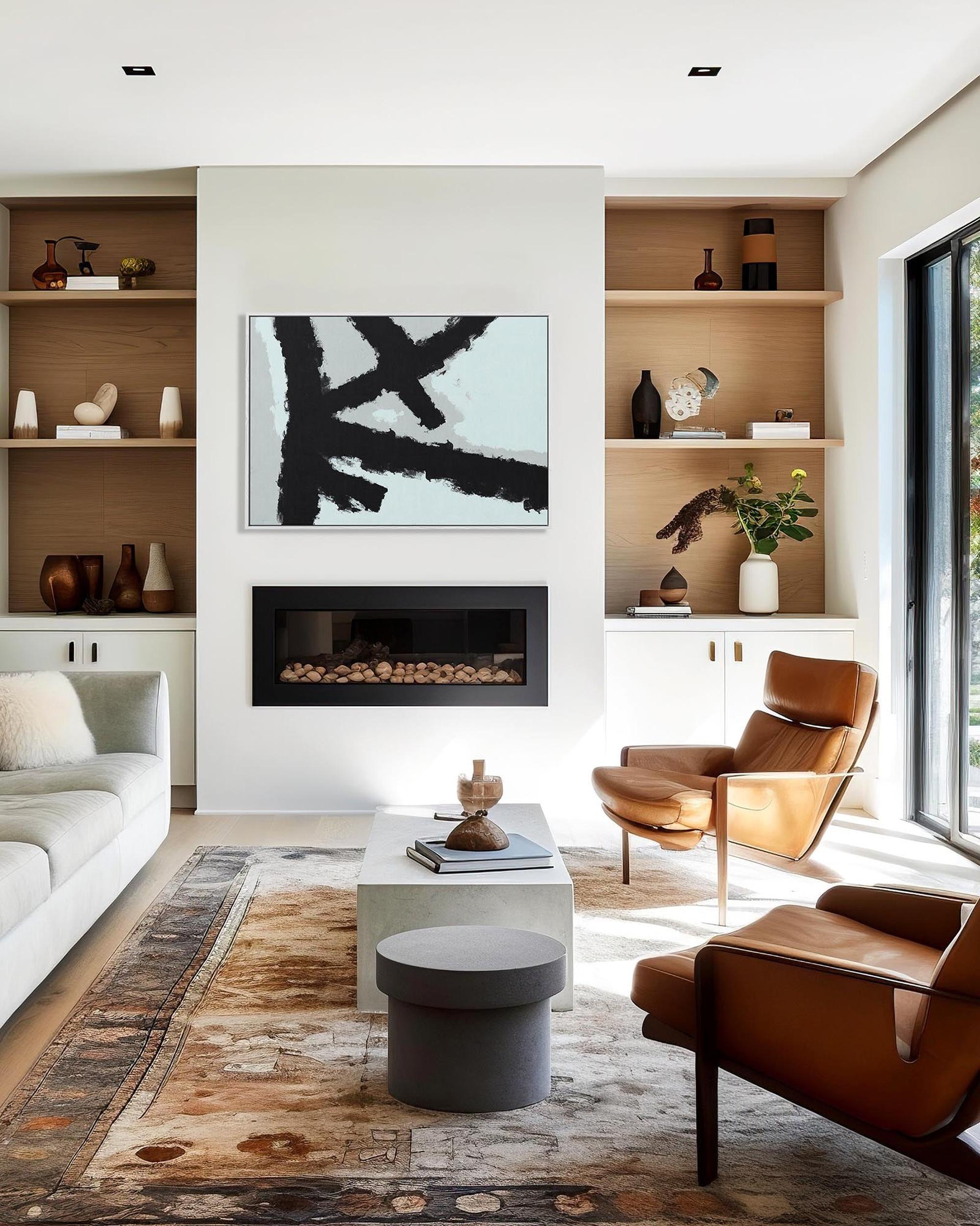 Modern living room with white sofa, brown chairs, and a fireplace.