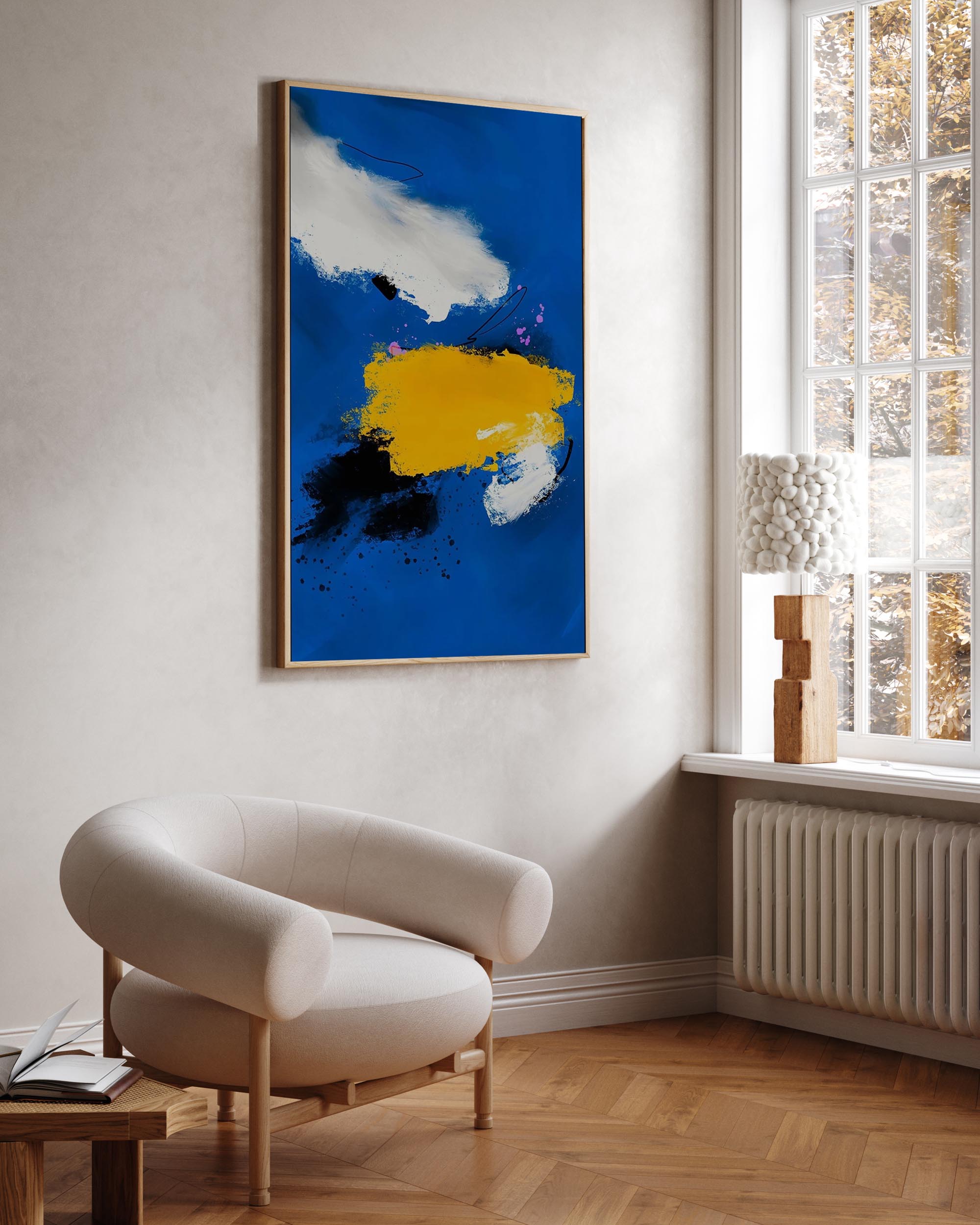 blue vibrant modern wall art in contemporary chic beige Scandinavian living room with statement boucle chair.