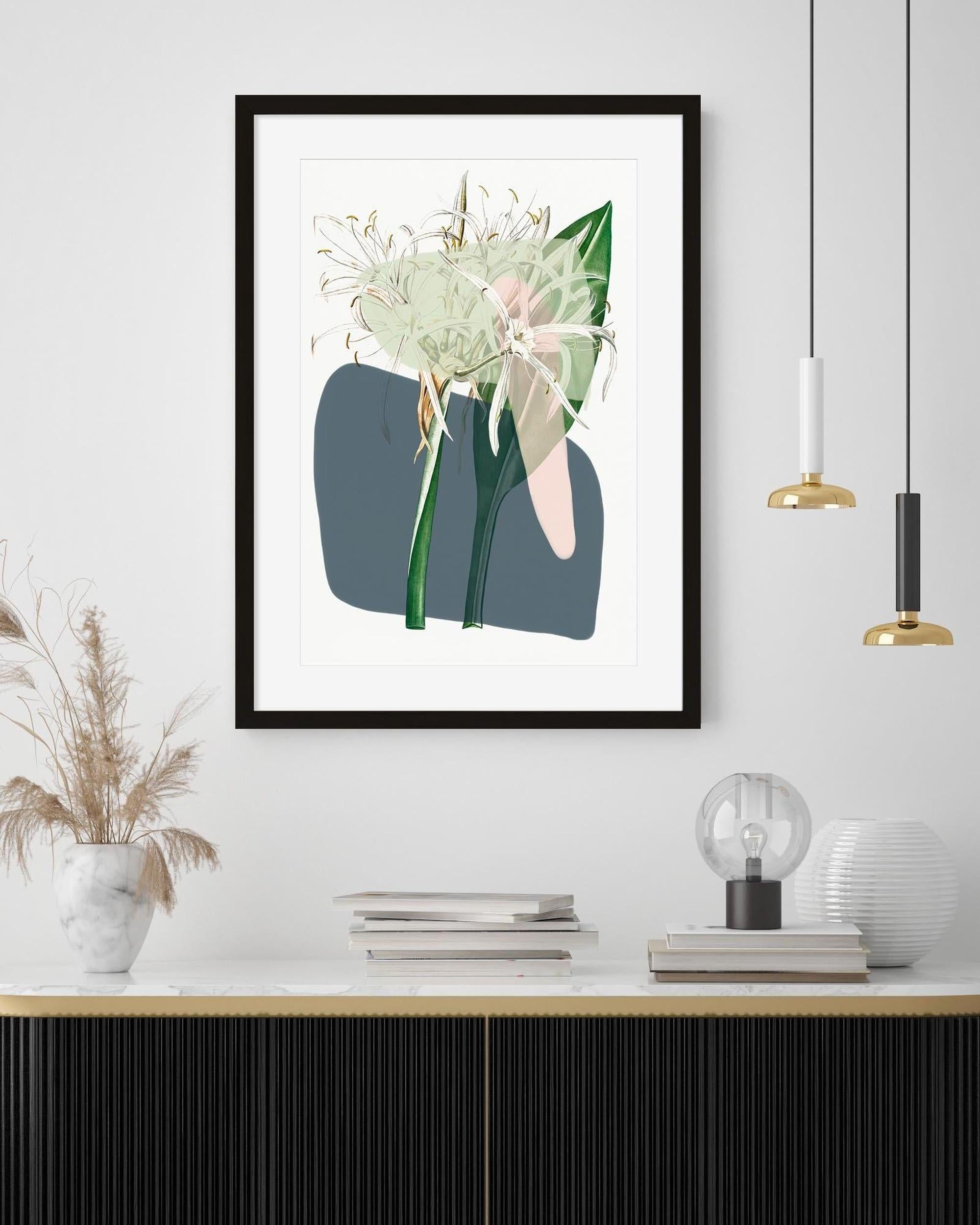 Framed artwork of a floral design on a wall above a wooden shelf.