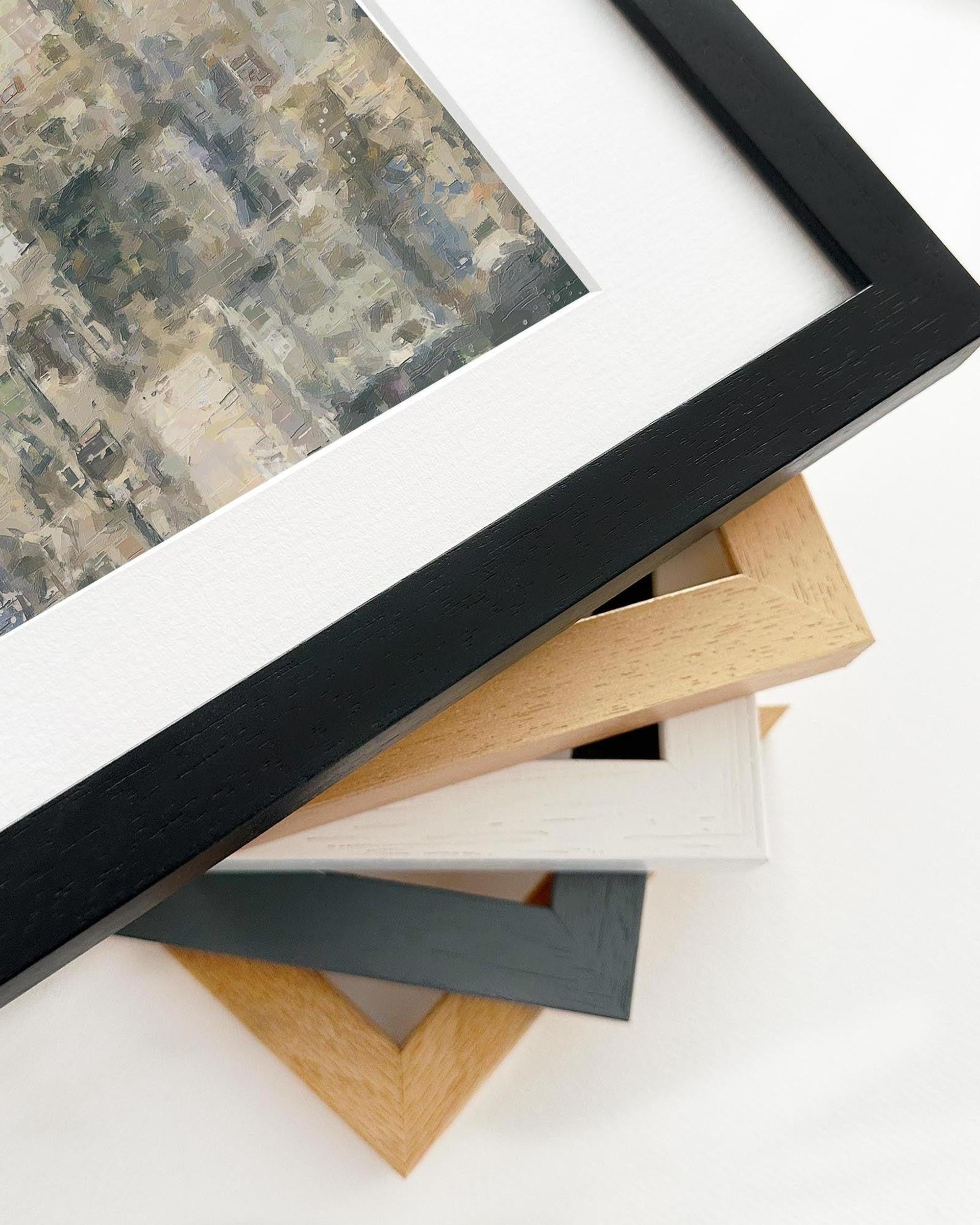 Collection of various picture frames on a white surface