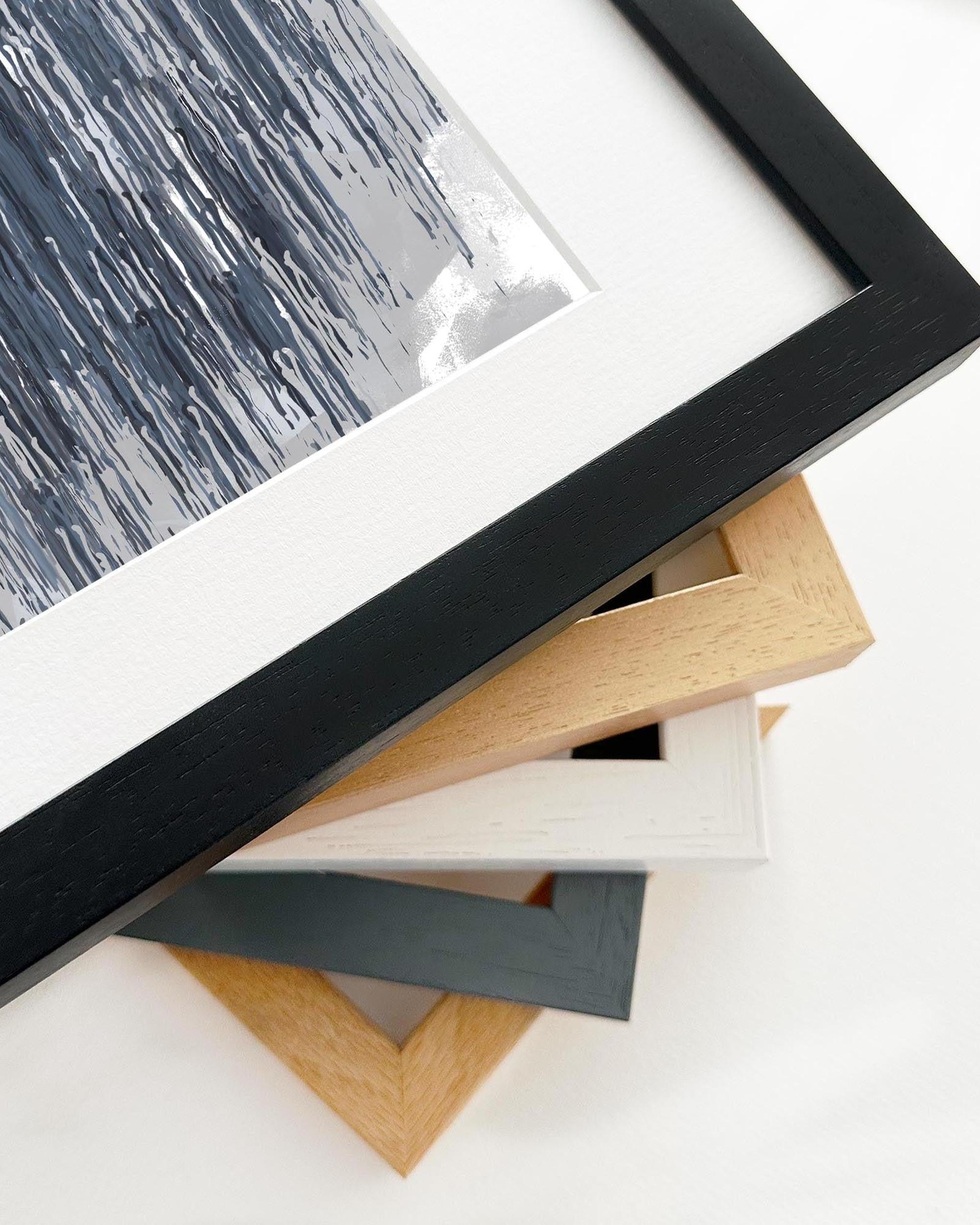 Collection of variously sized picture frames on a white background