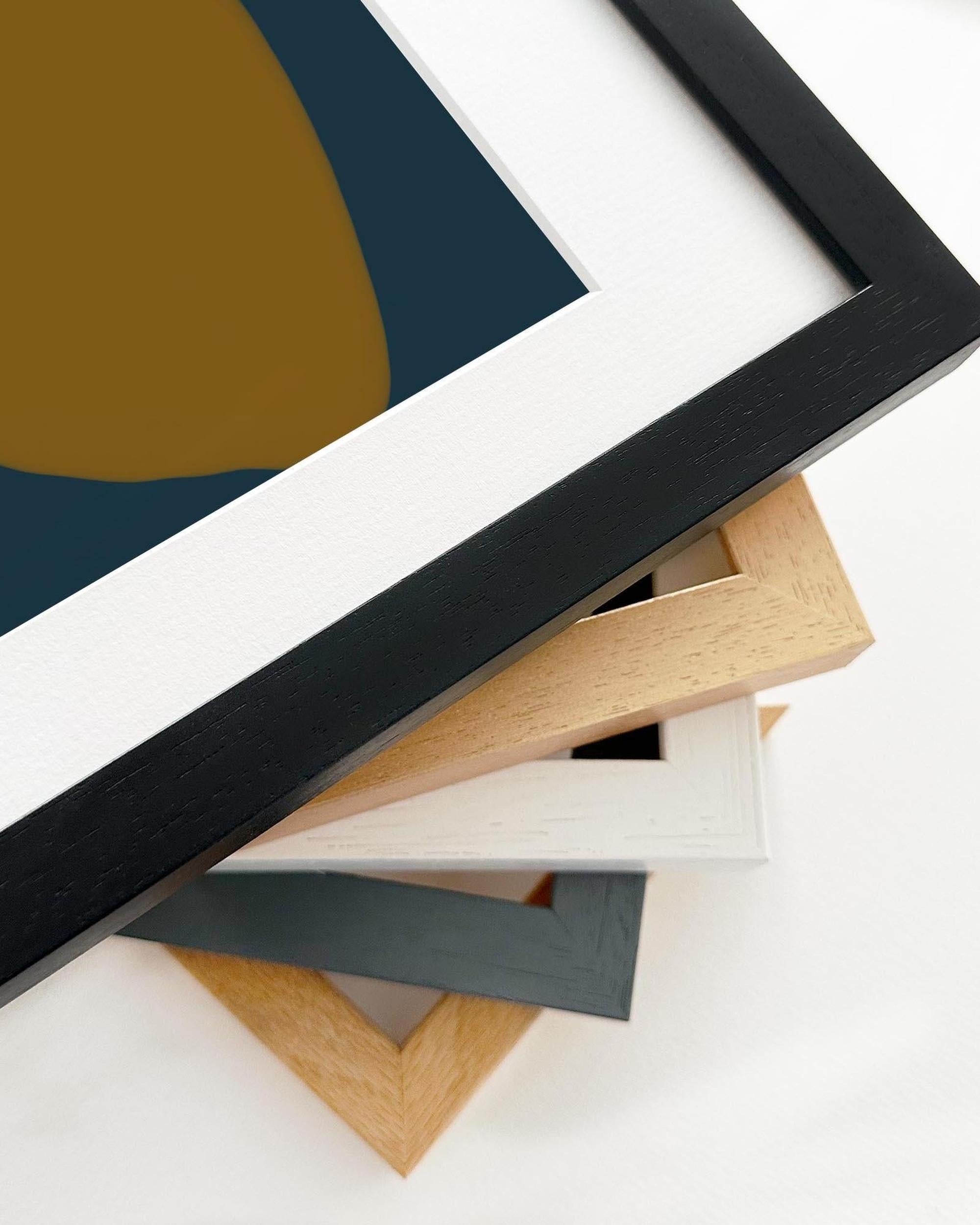 Stack of various picture frames on a white background