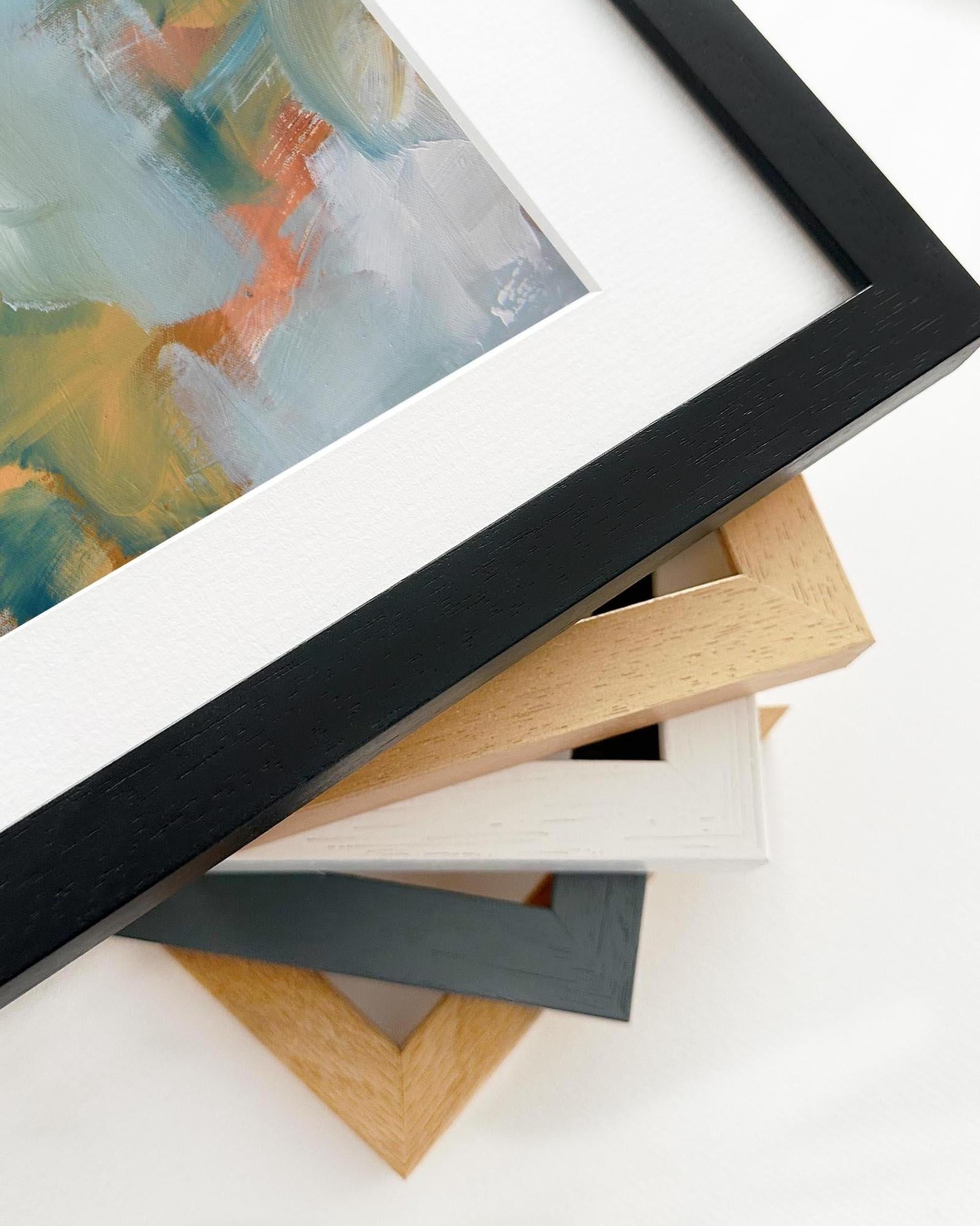 Close-up of various picture frames on a white background
