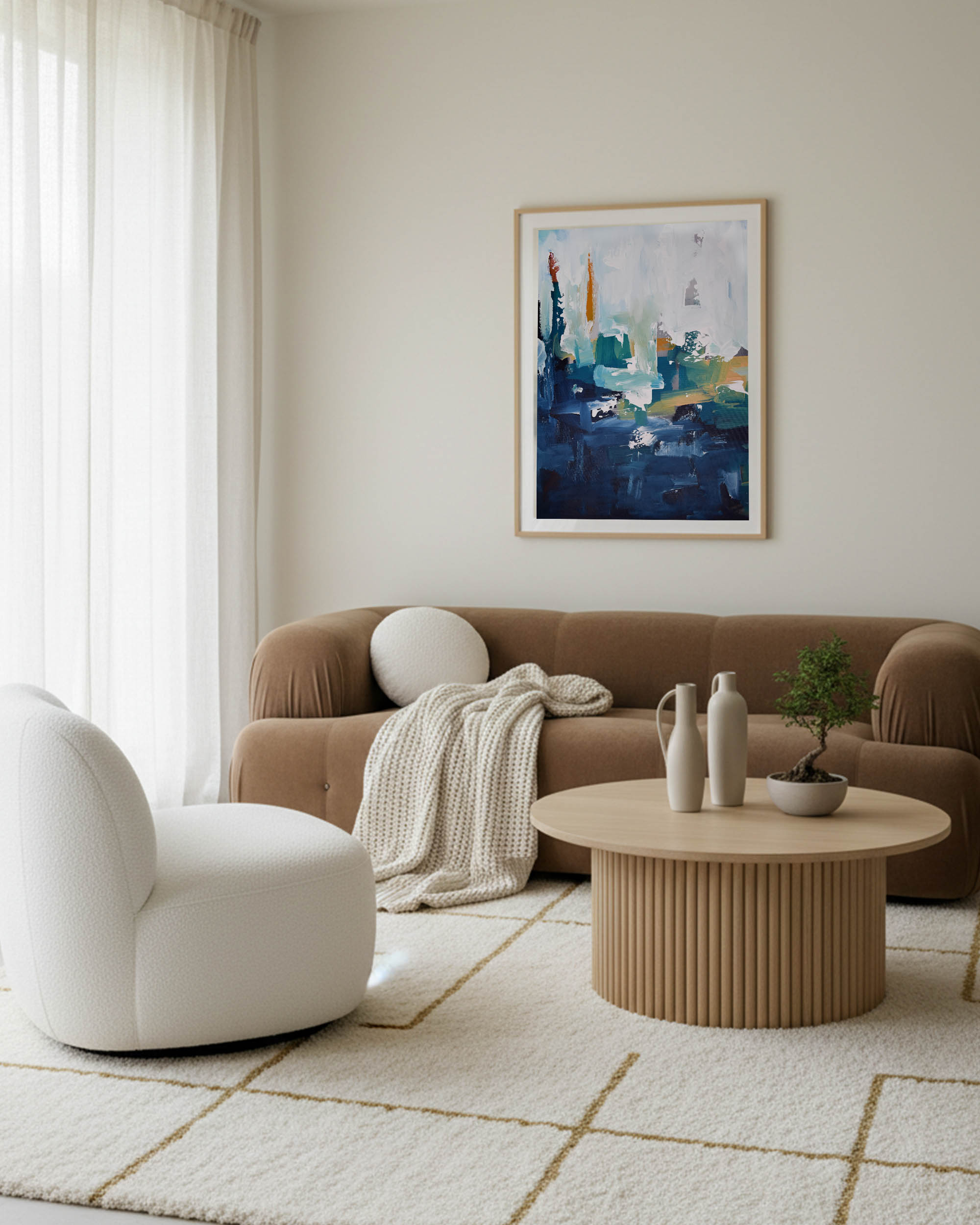 Navy abstract pictures on wall in living room above brown 3 seater sofa, 40 inch tall pictures, in Scandinavian living room