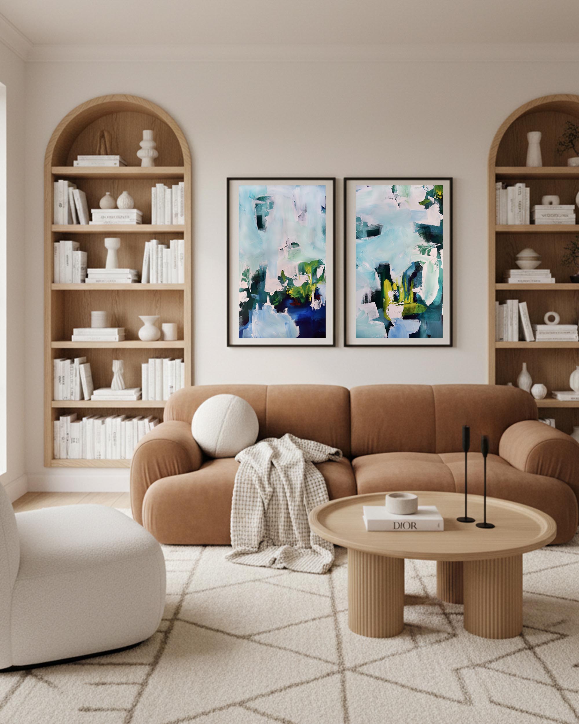 Modern living room with a brown sofa, round coffee table, and abstract wall art.