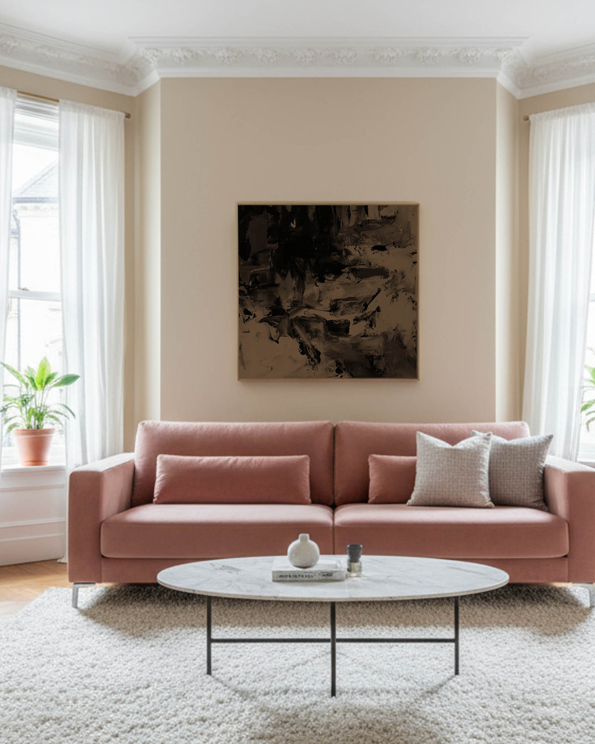 modern victorian apartment with high ceilings brown umber wall art painting on canvas with blush sofa and marble table