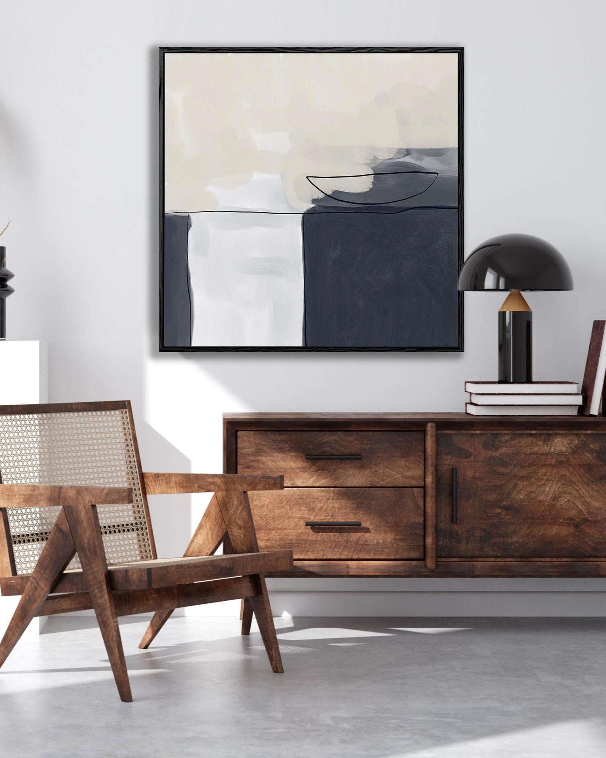 Modern living room with wooden furniture, abstract art, and a chair.