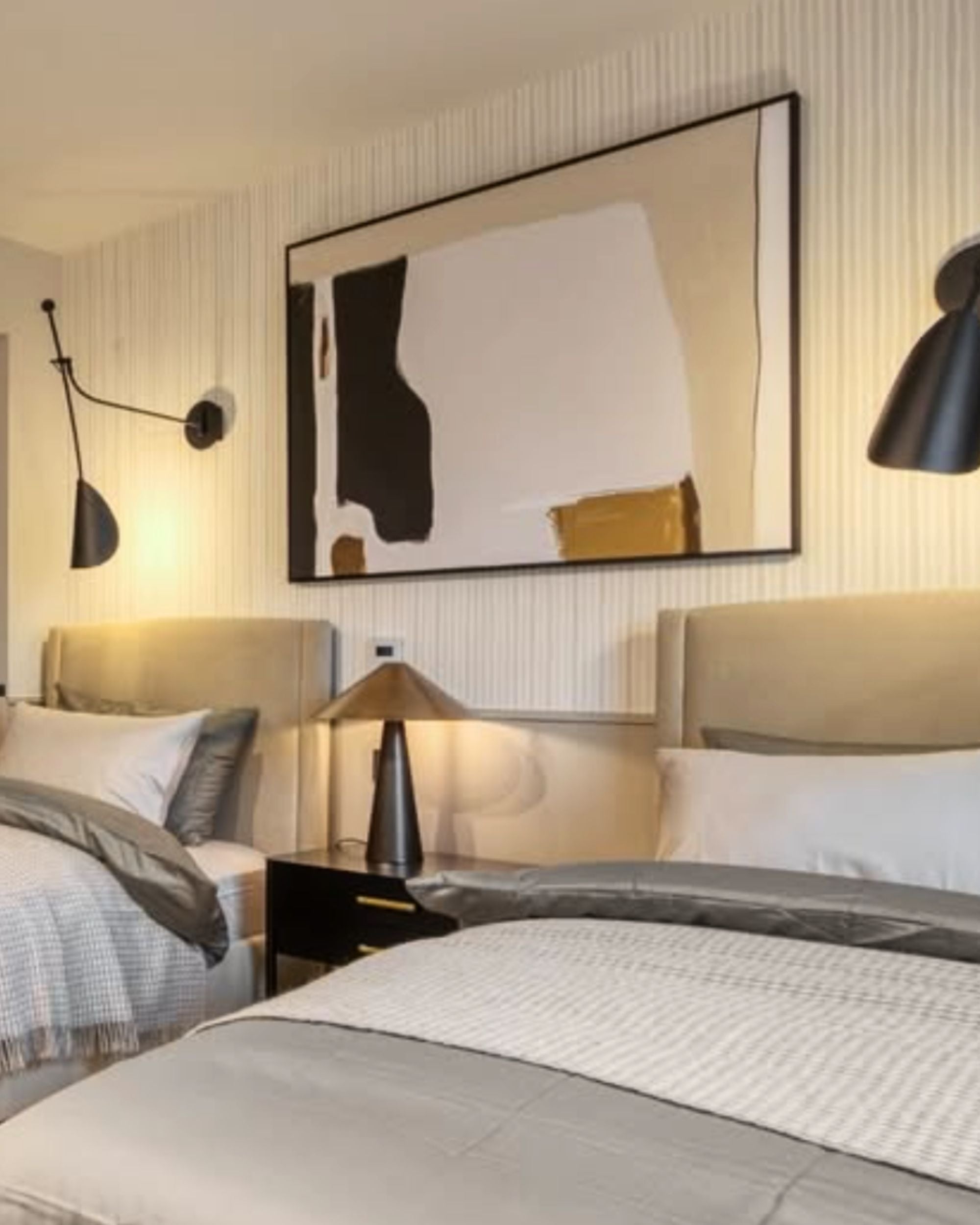 large neutral canvas wall art above bed in bedroom