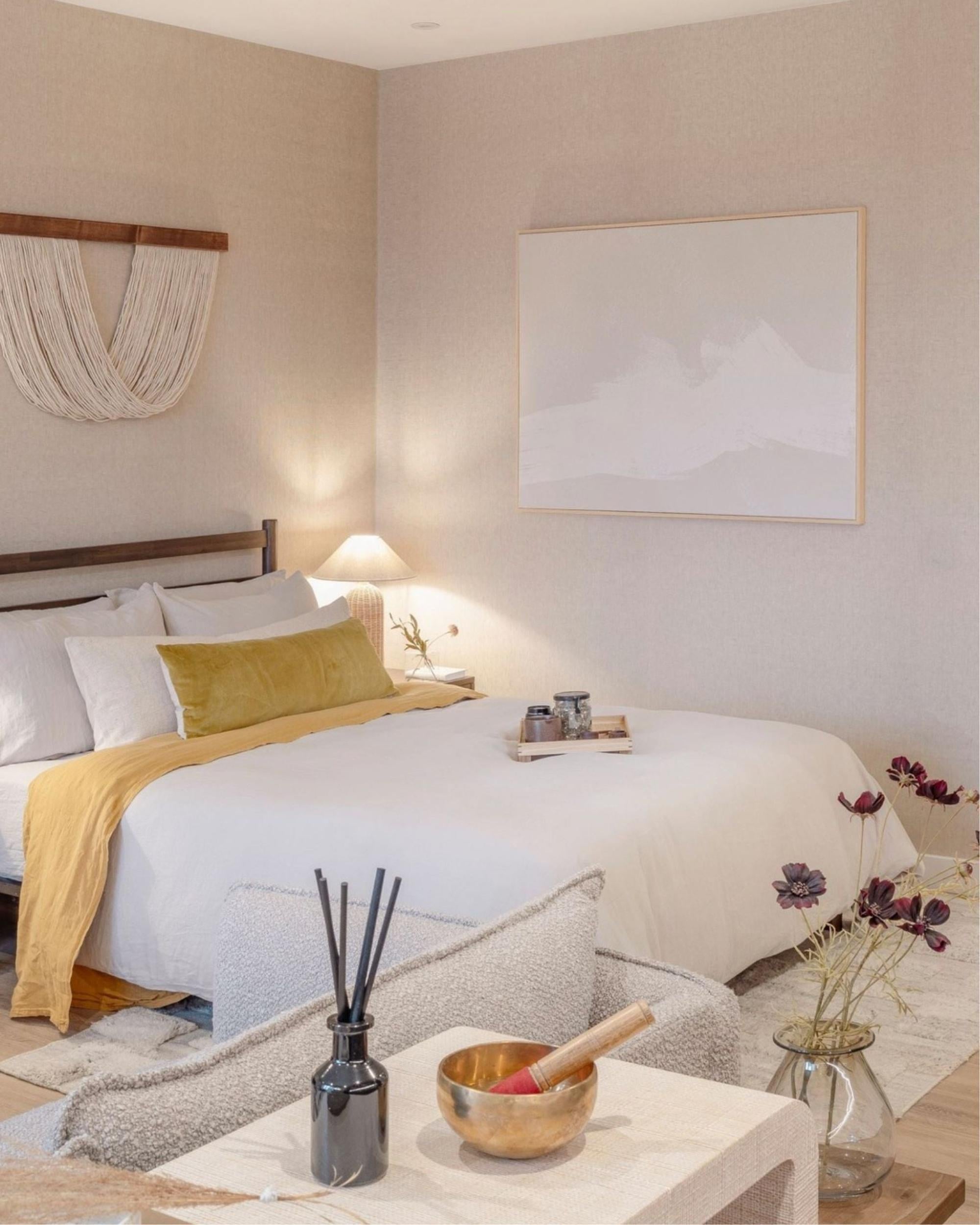 Extra large neutral abstract sands wall art print on canvas in luxury aesthetic refined bedroom with beige walls and luxury accessories.