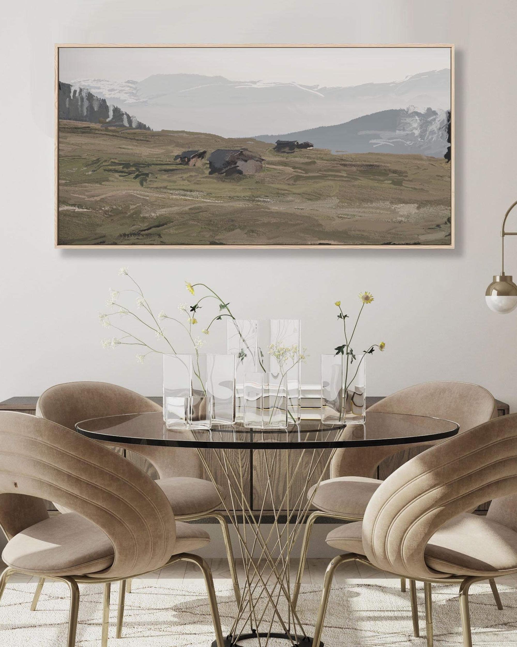 Dining room with a round glass table and wavy back chairs, featuring a mountain landscape painting on the wall.