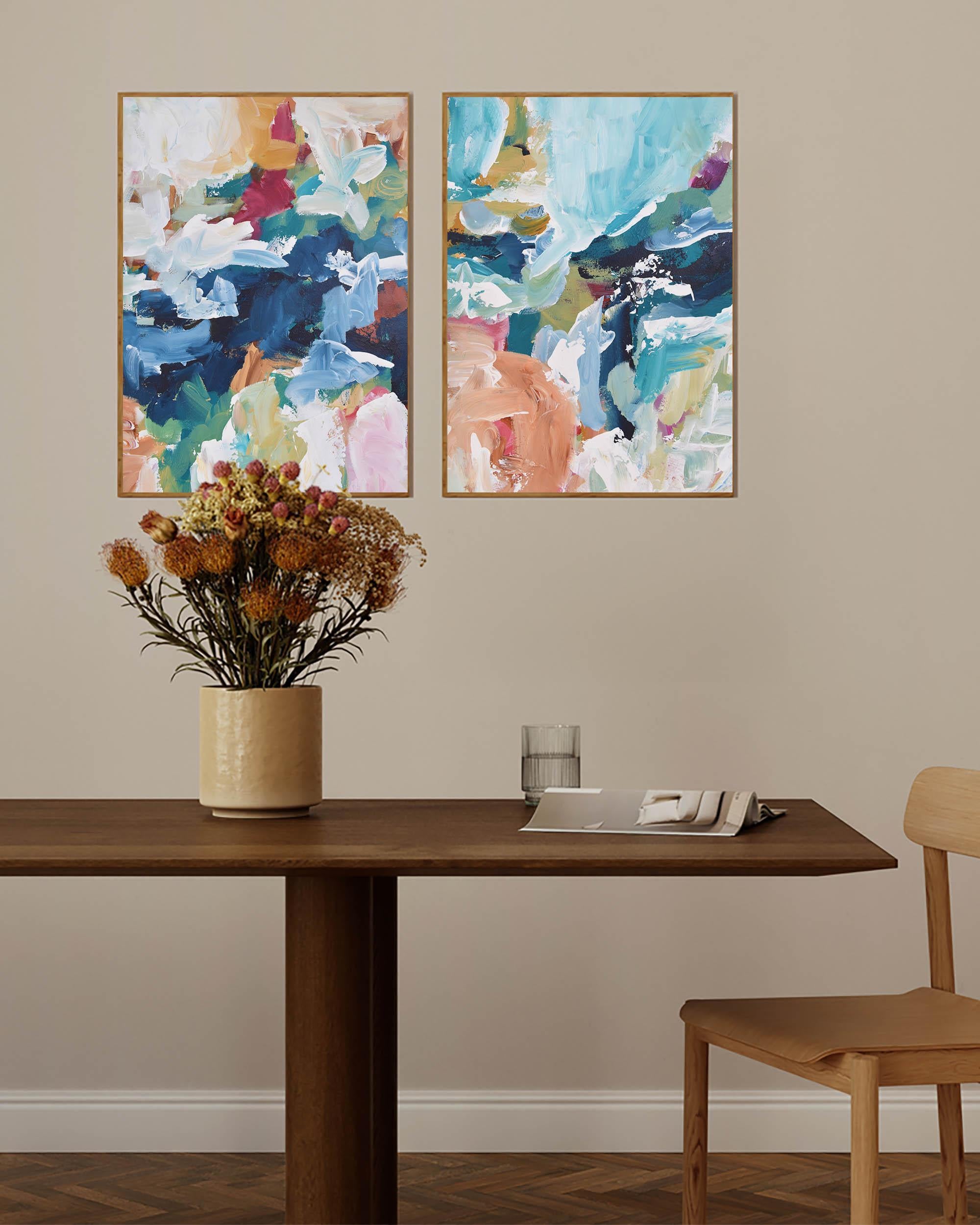 Dining room with abstract art on the wall, a table, and chair.