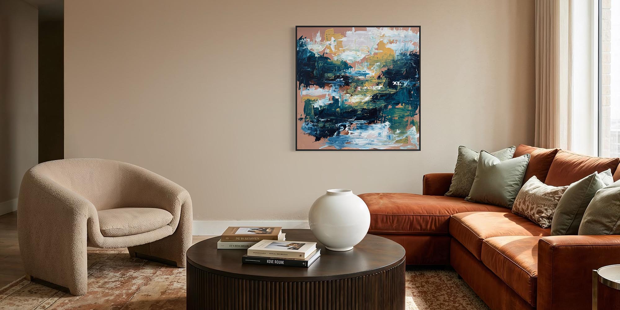 Living room with brown sectional sofa, beige armchair, and abstract painting on wall.