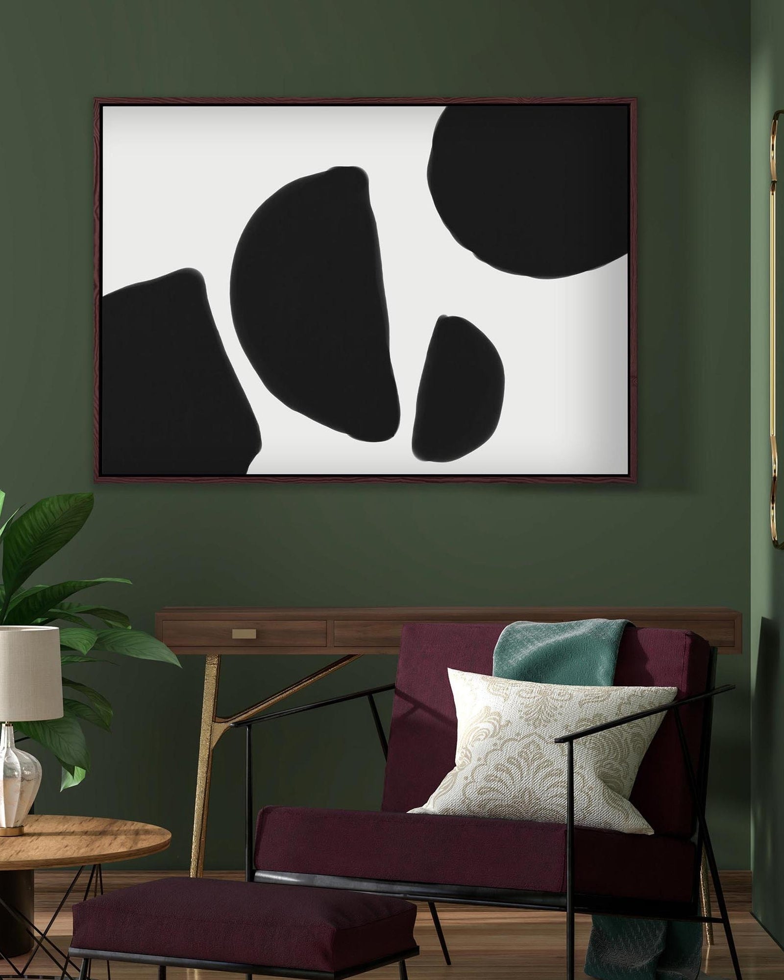 Modern living room with abstract art, purple sofa, and green wall.