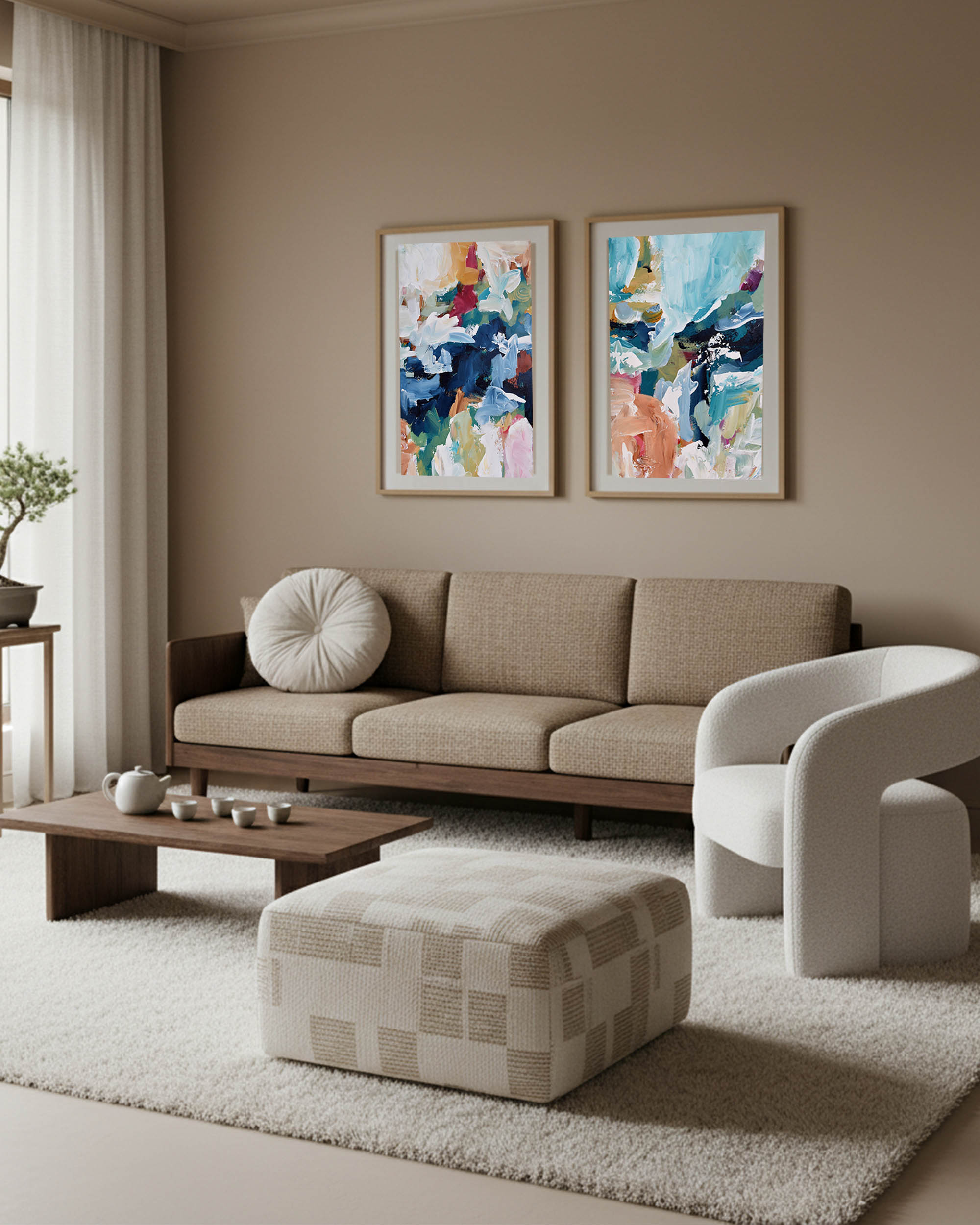 colourful large abstract wall art in oak frames in minimal japandi living room with brown sofa and geometric checkered boucle ottoman and white occasion chair.