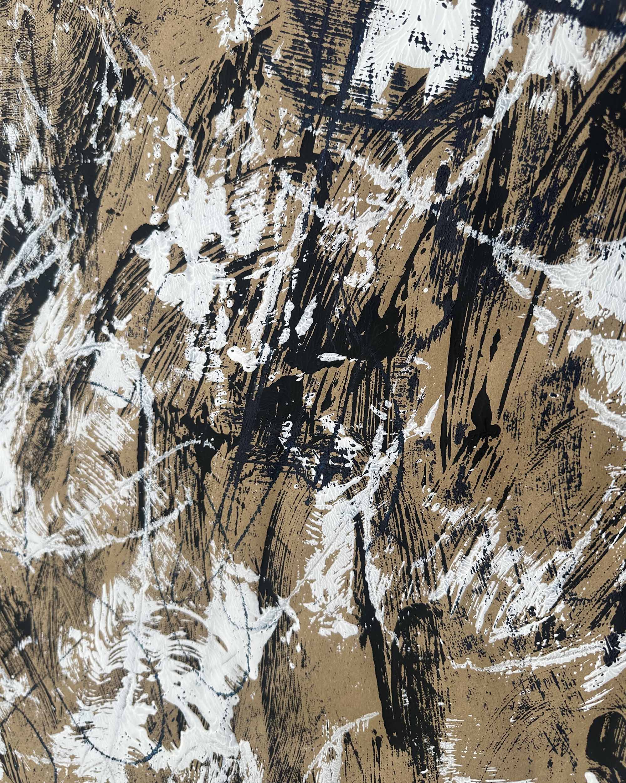 Abstract pattern with black, white, and beige colors on a textured background