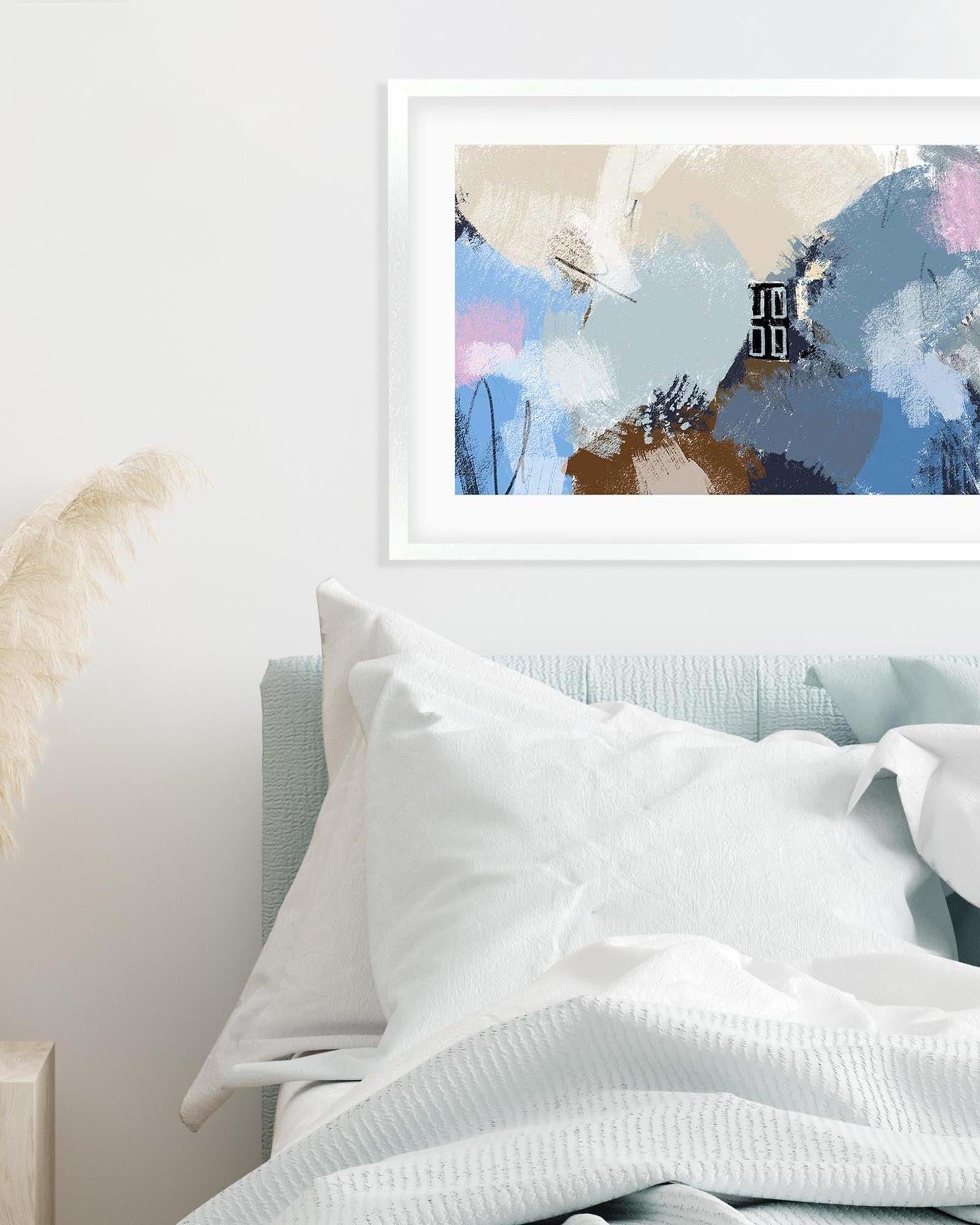 Abstract art print on a wall above a bed with white bedding