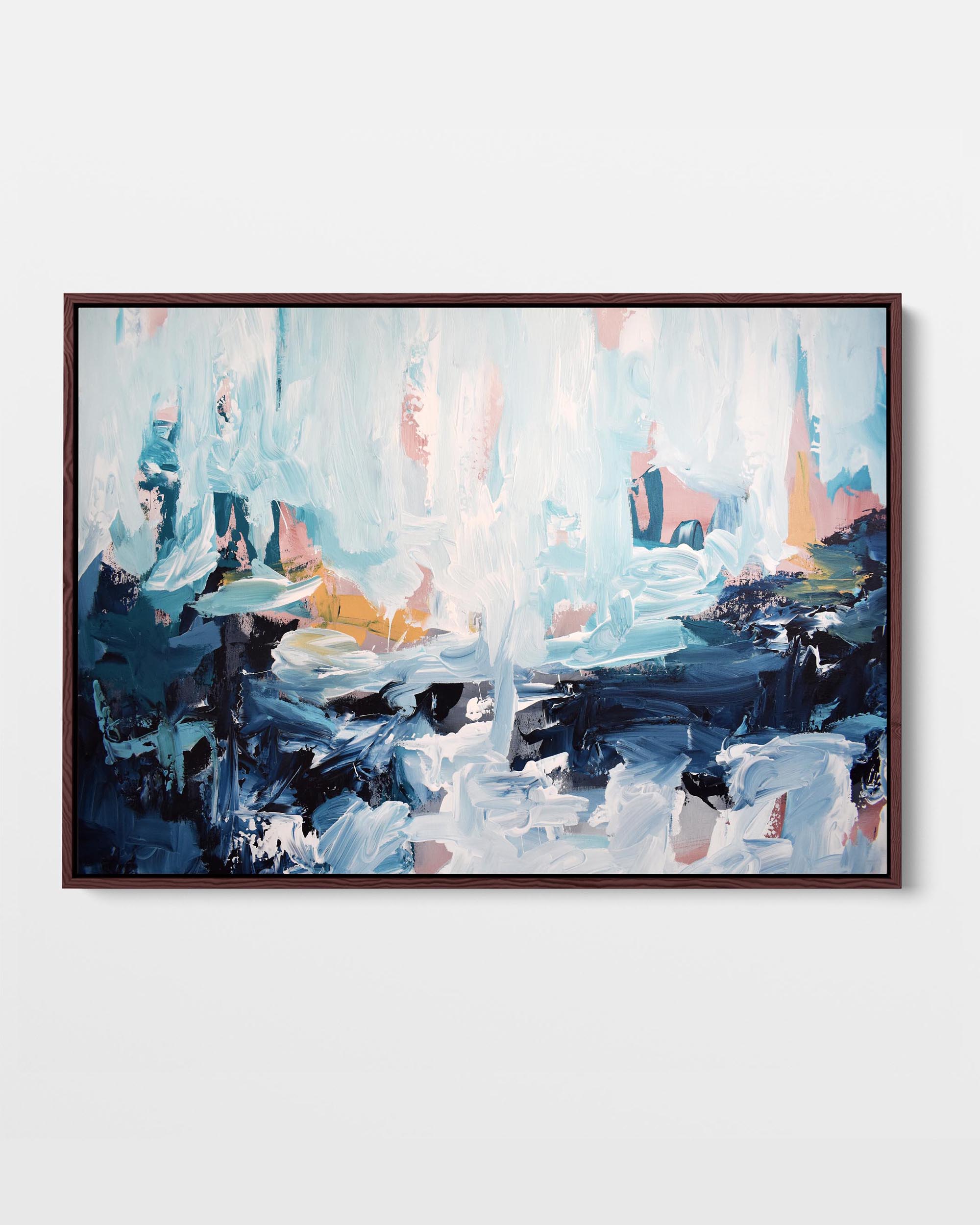 A framed canvas with an abstract design featuring modern blue, orange, white, and pink tones, displayed against a plain background.