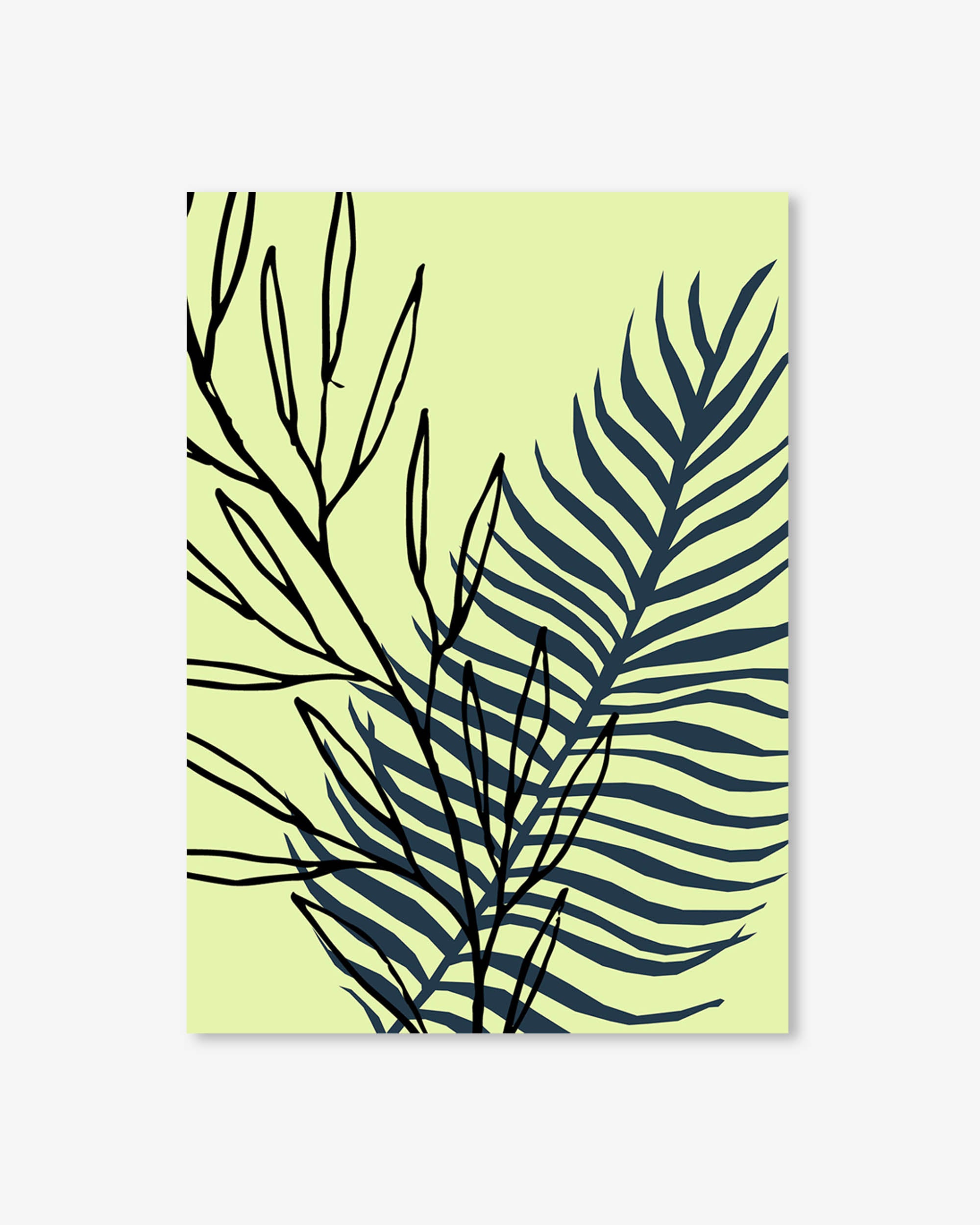 Framed artwork with black leaf silhouettes on a light green background