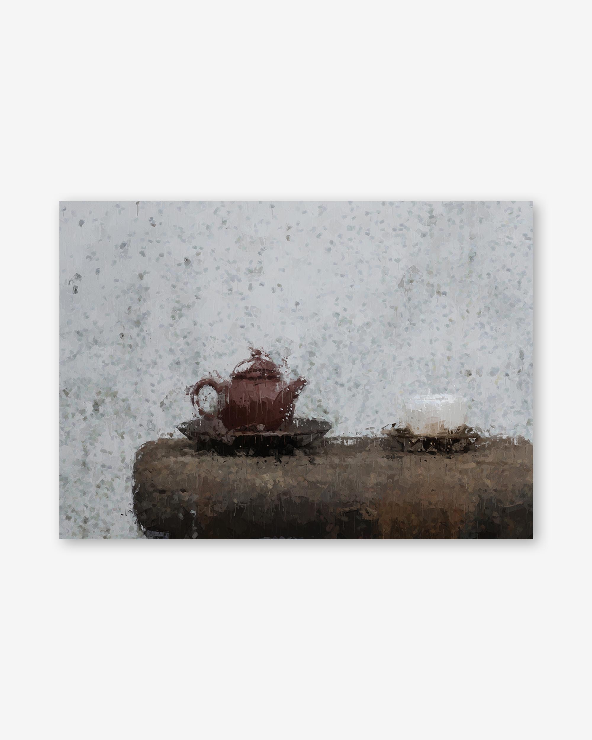 Teapot and cup on a stone surface with a textured wall background
