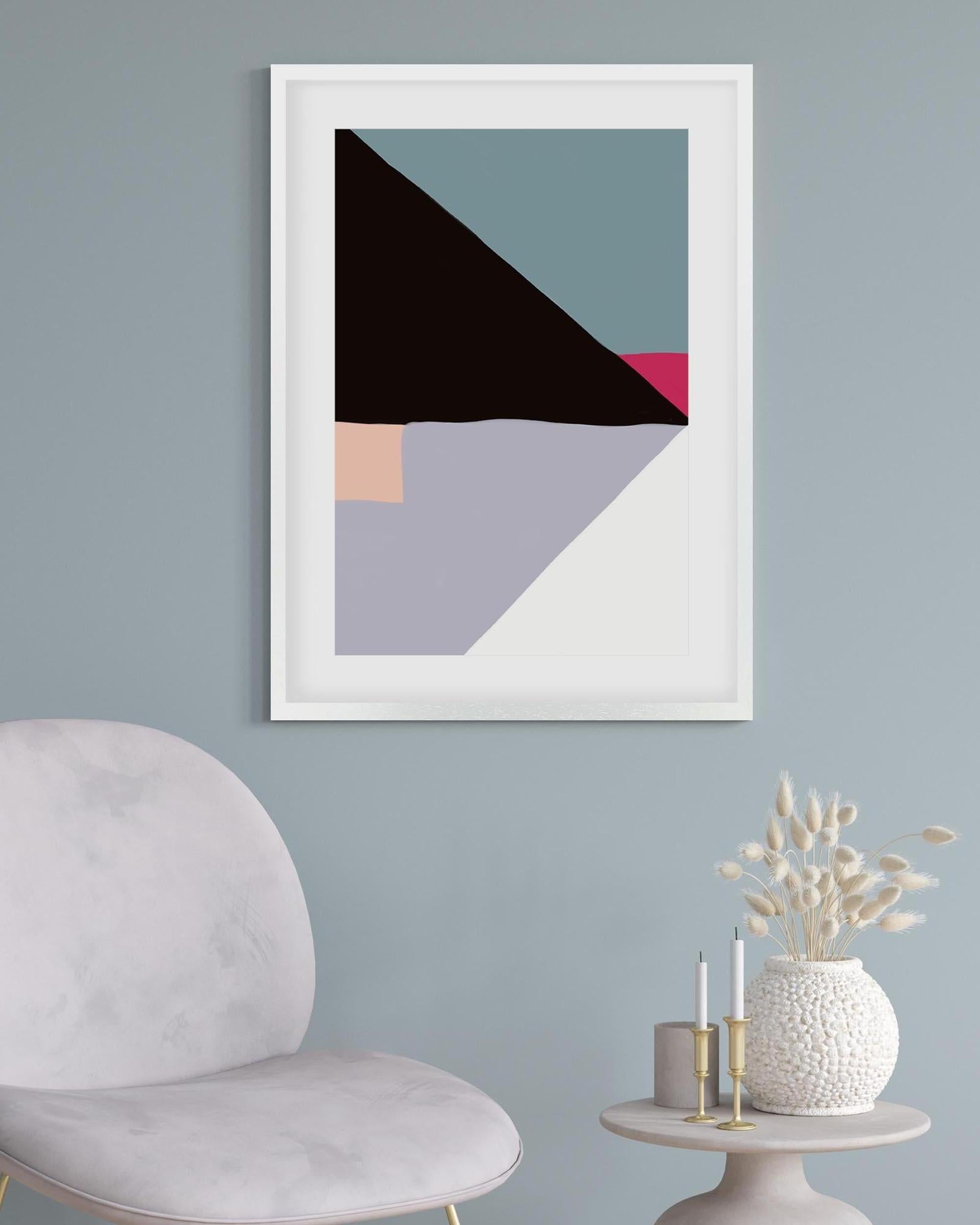 Framed abstract art piece on a wall with a chair and decorative items below.