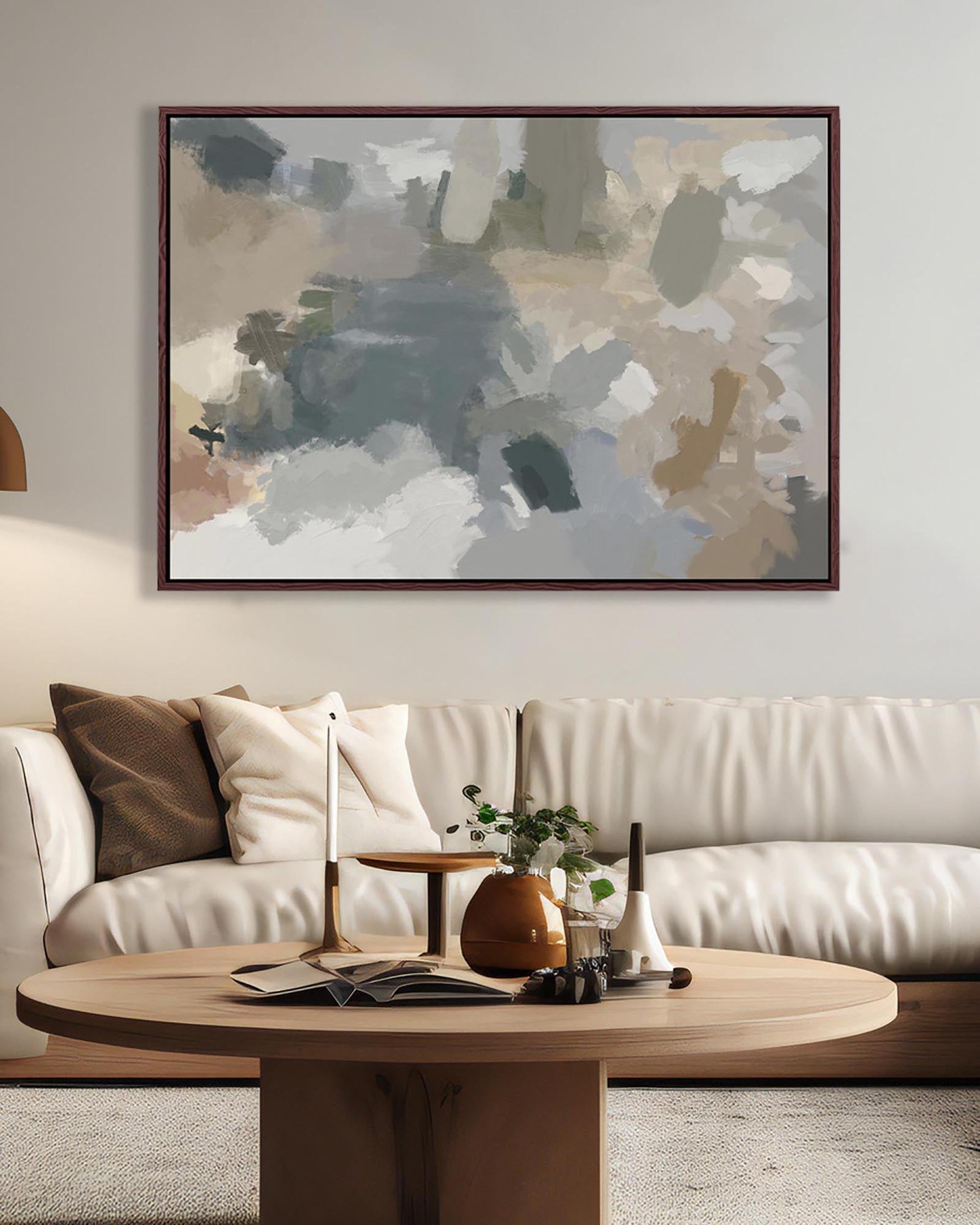 Living room with a beige sofa, round wooden coffee table, and abstract painting on the wall.
