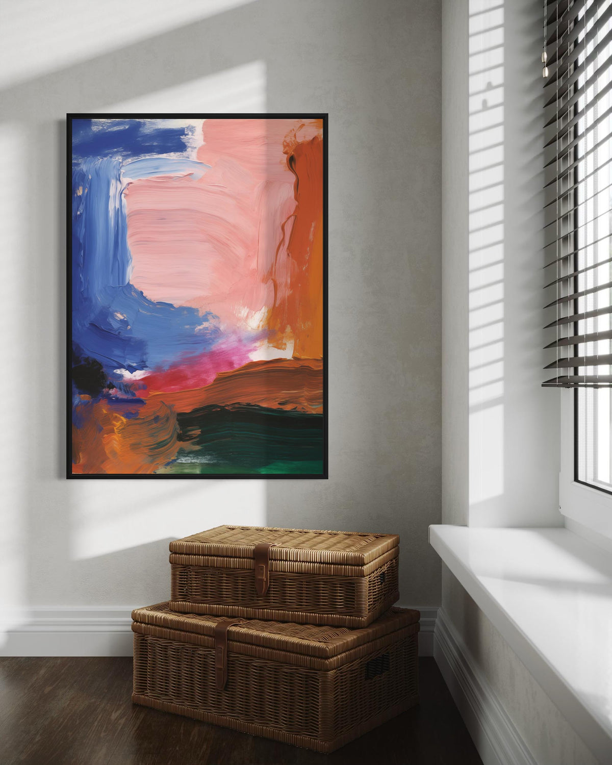 Colorful abstract painting on a wall above two wicker baskets.
