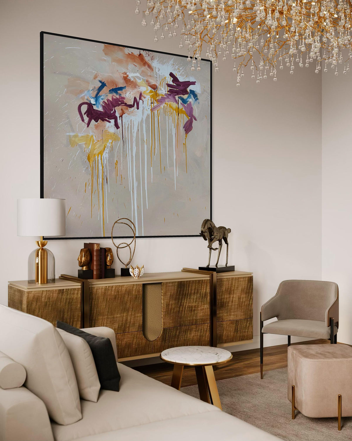Modern living room with wooden console table, abstract painting, and chandelier.