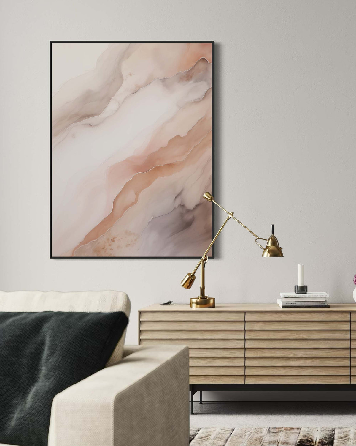 Modern interior with abstract art, lamp, and sofa on a light gray wall.