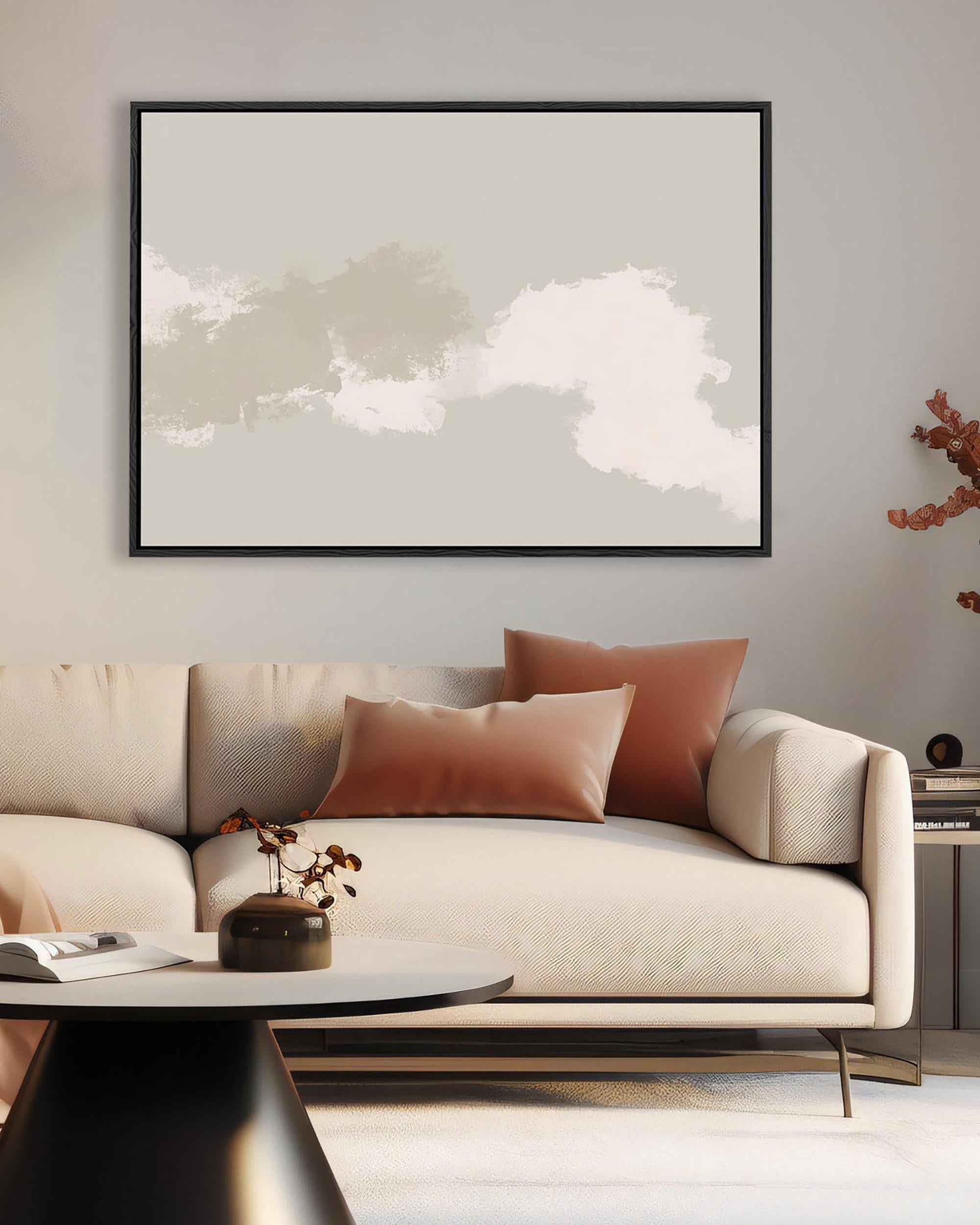 Modern living room with a beige sofa, abstract art, and decorative elements.