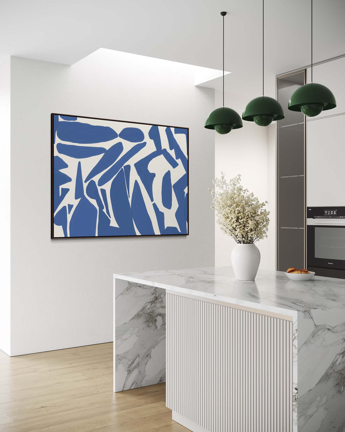 Modern kitchen interior with abstract blue artwork on the wall.