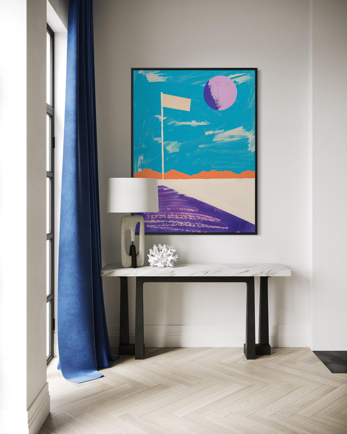 Modern interior with a console table, lamp, and abstract artwork on a wall.