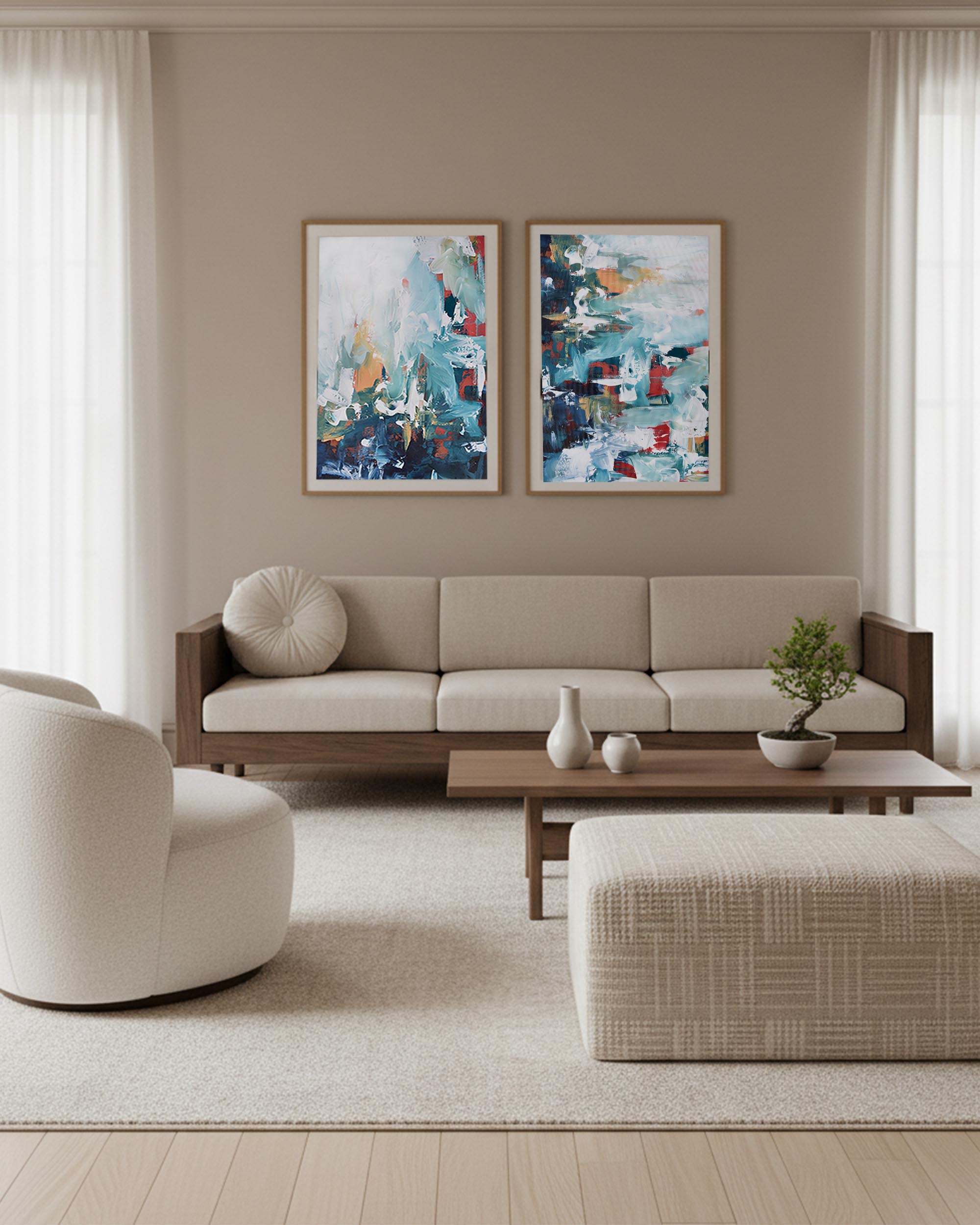 Modern living room with a beige sofa, armchair, and abstract paintings on the wall.
