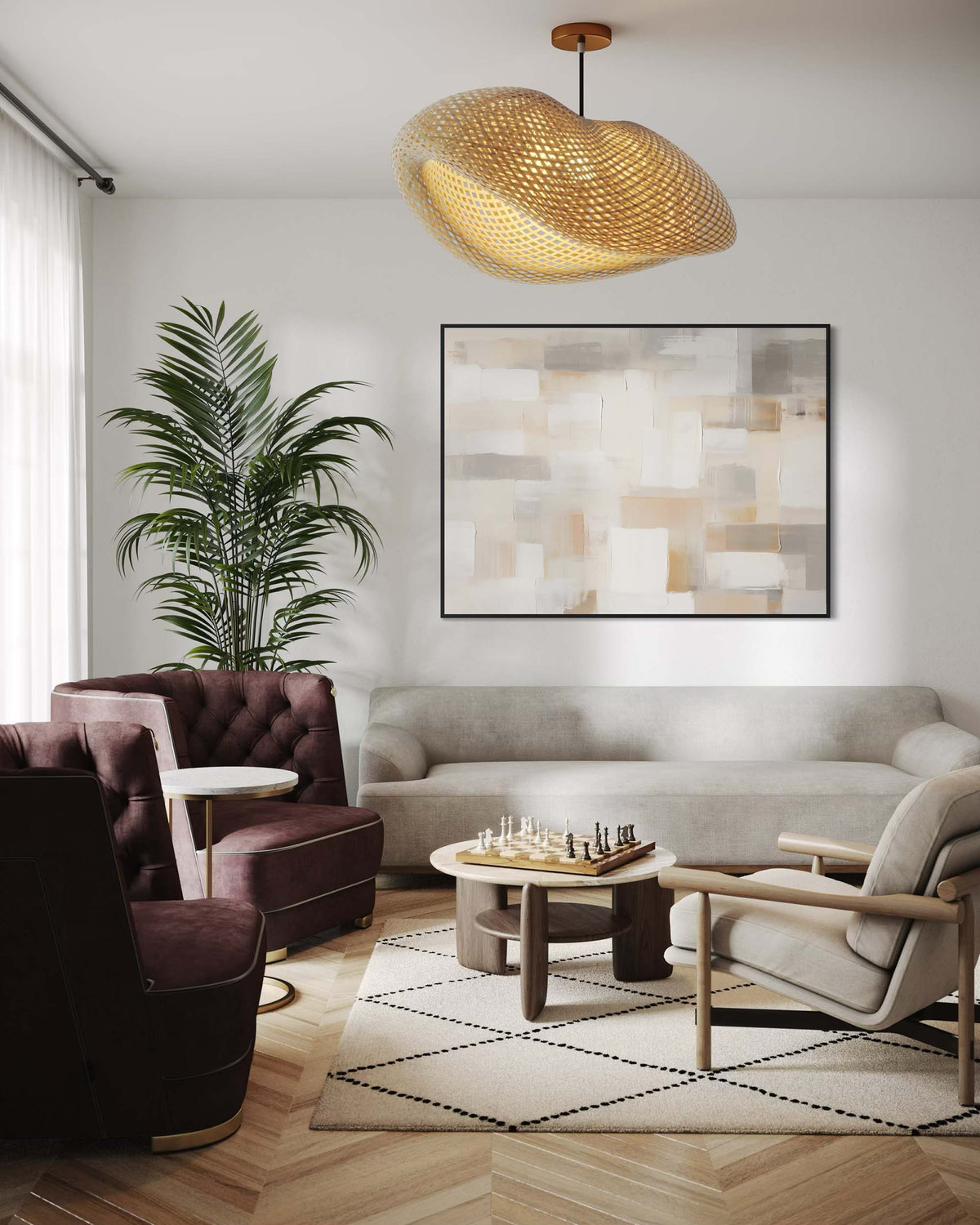 Modern living room with a gray sofa, brown armchair, and abstract art on the wall.