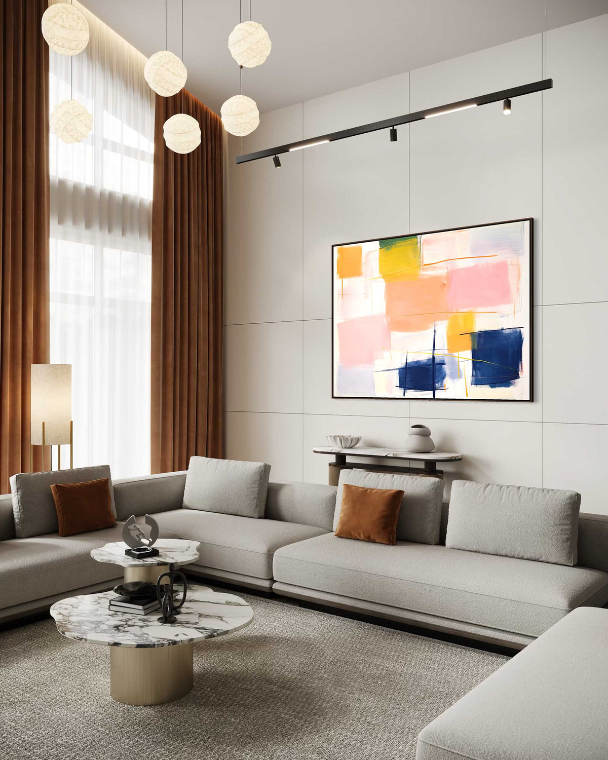 Modern living room with a gray sofa, abstract painting, and decorative items.