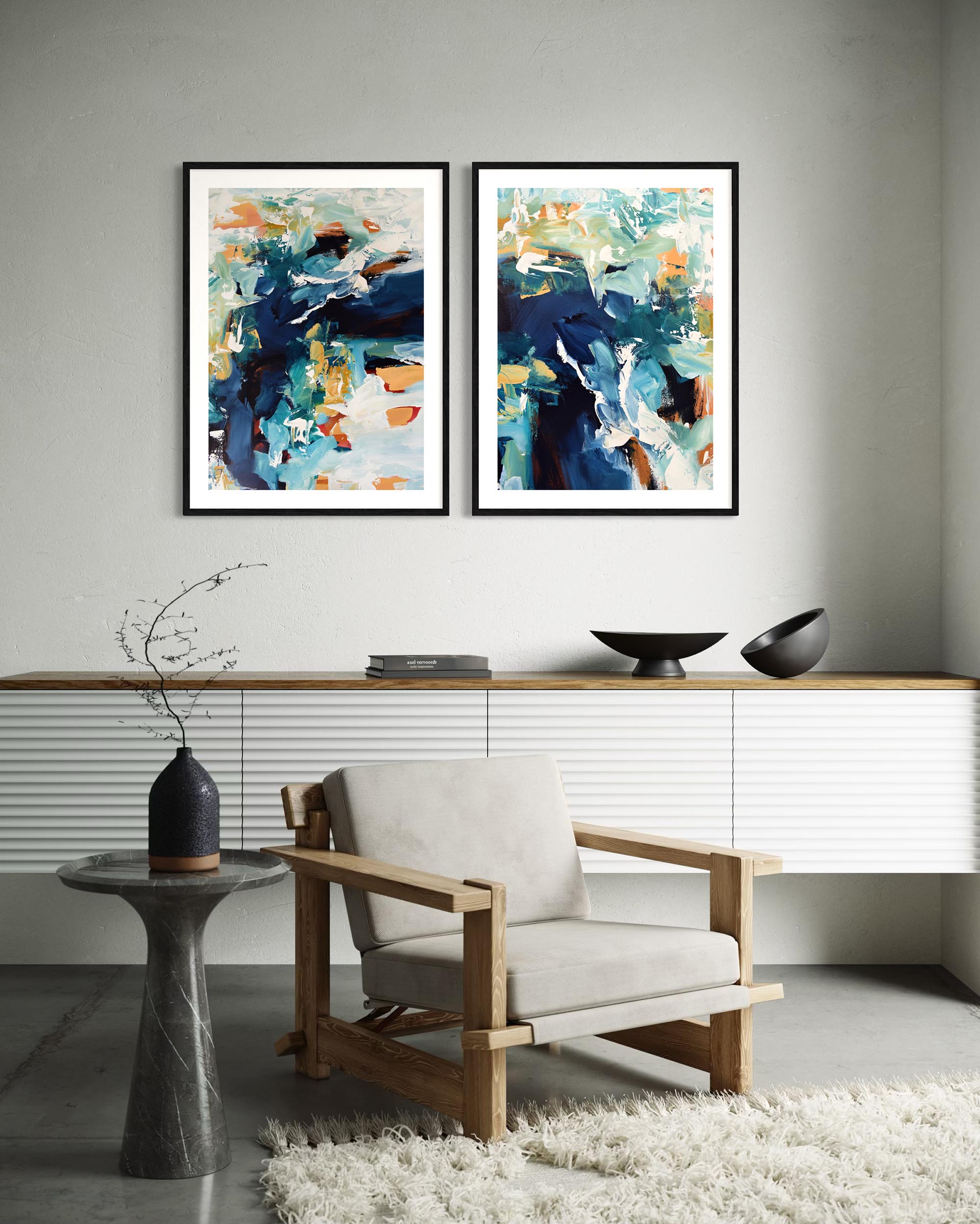 Modern interior with abstract art on the wall and a chair in the foreground.