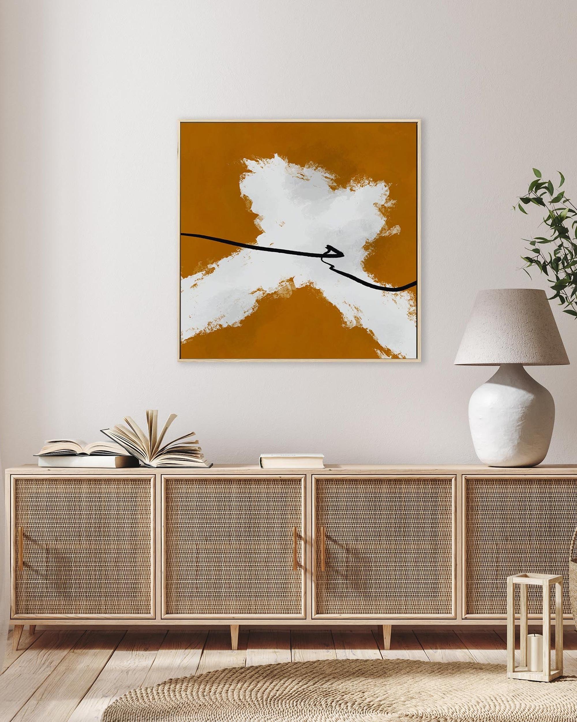 Modern interior with a sideboard, abstract art, and a lamp.