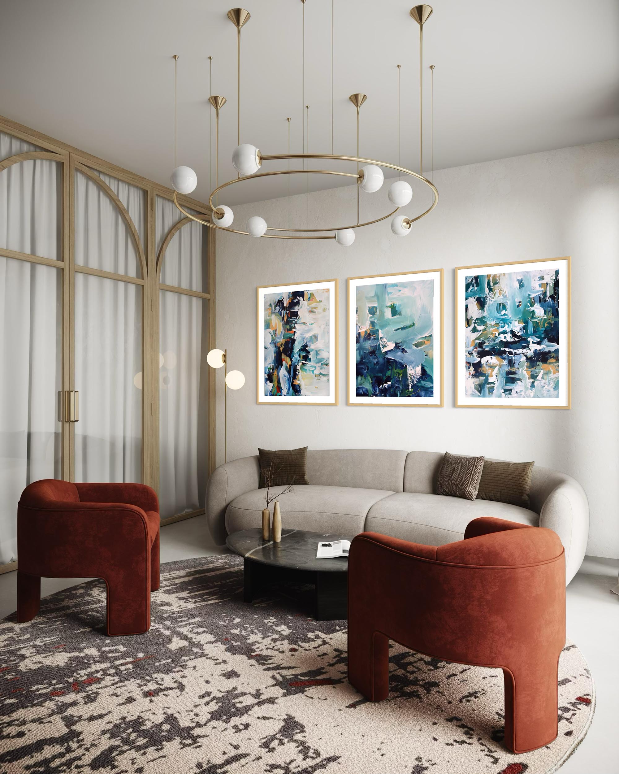 Modern living room with a round sofa, two armchairs, and abstract art on the wall.