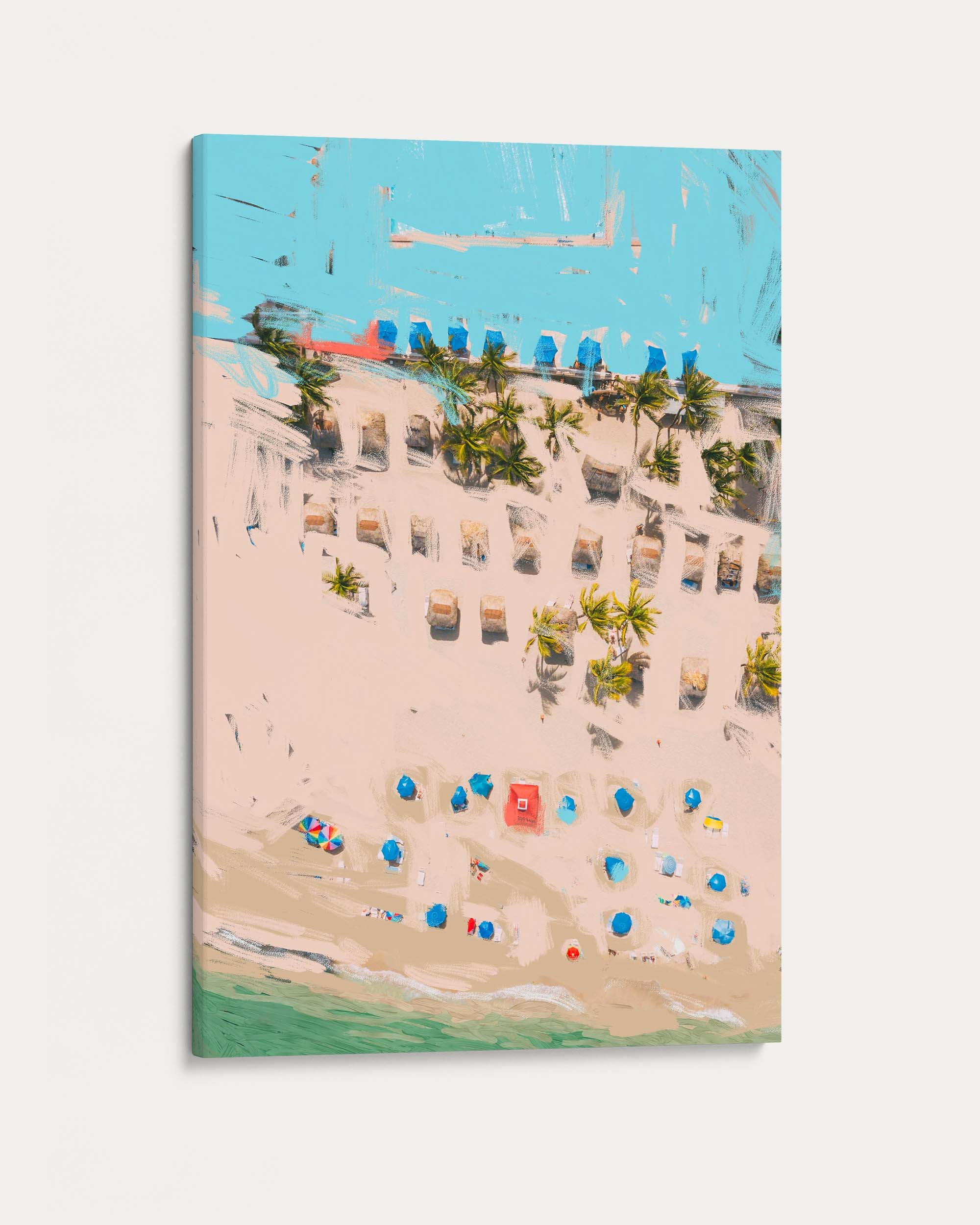Canvas print of a beach scene with lounge chairs and umbrellas.