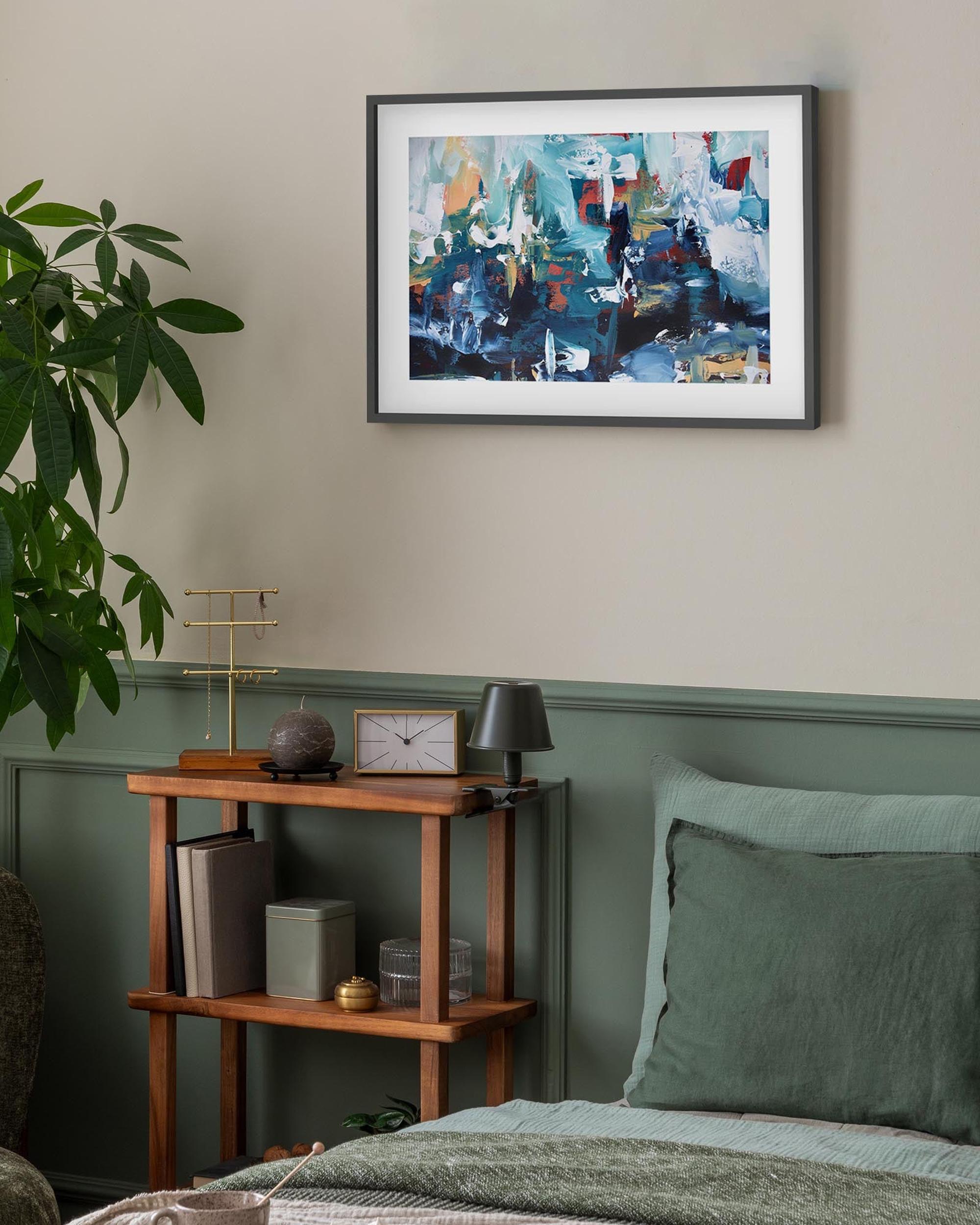 Room interior with a bed, plant, shelf, and abstract painting on the wall.