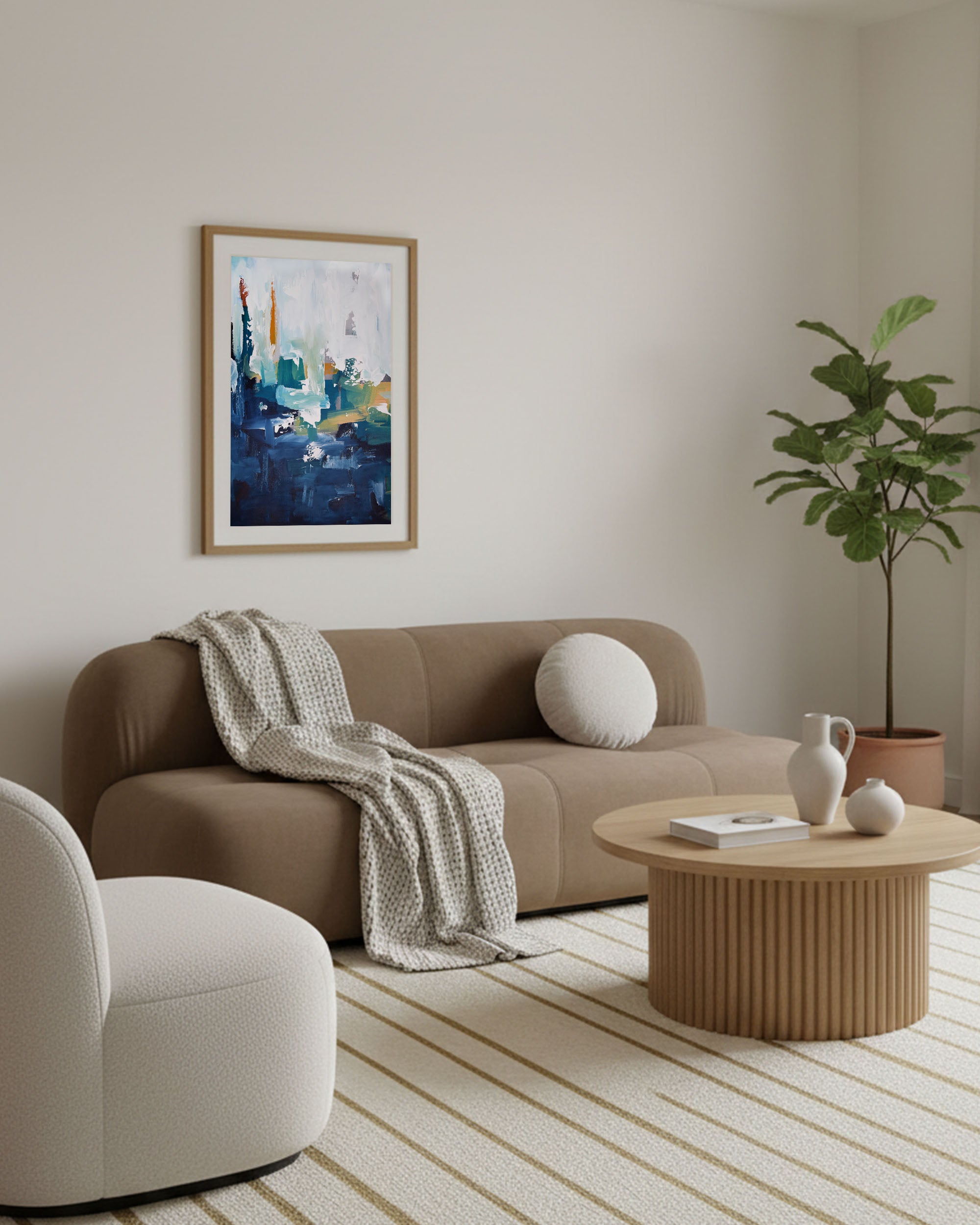 Japandi living room interior with muted brown fabric sofa, white boucle cushions and medium framed abstract wall art on wall in oak frame.