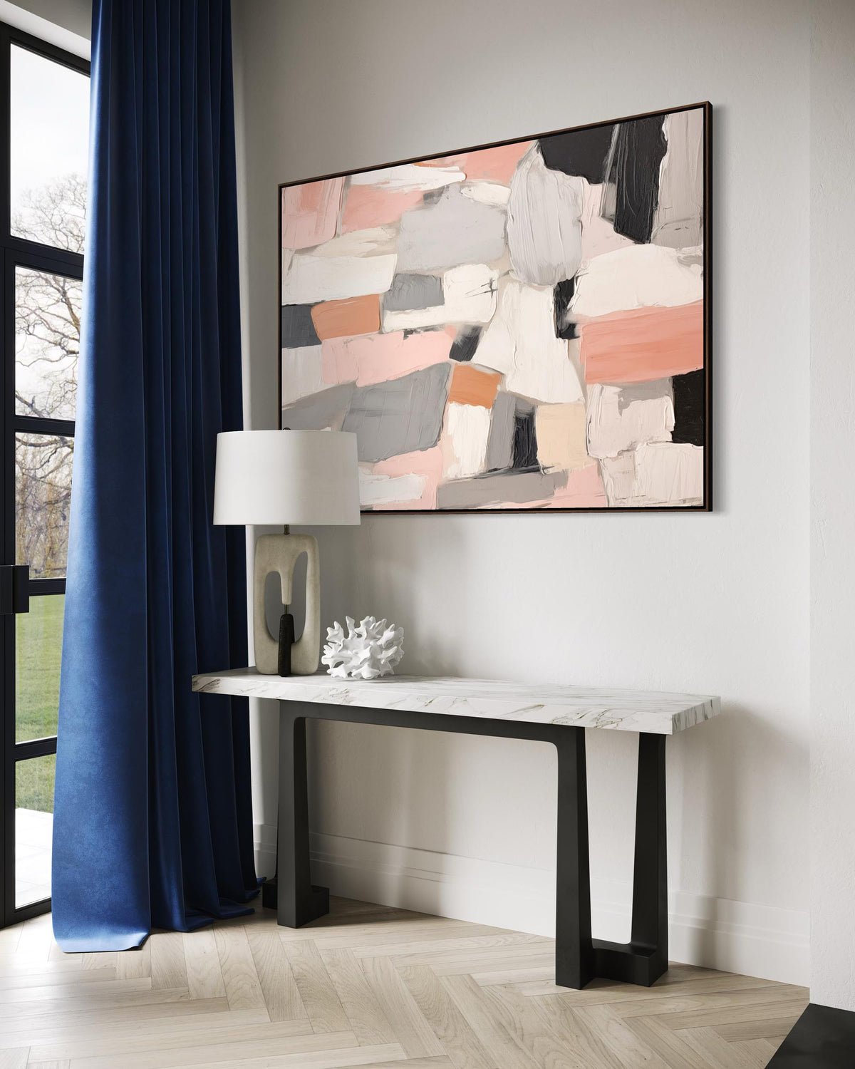 Modern interior with abstract art, console table, and blue curtain.